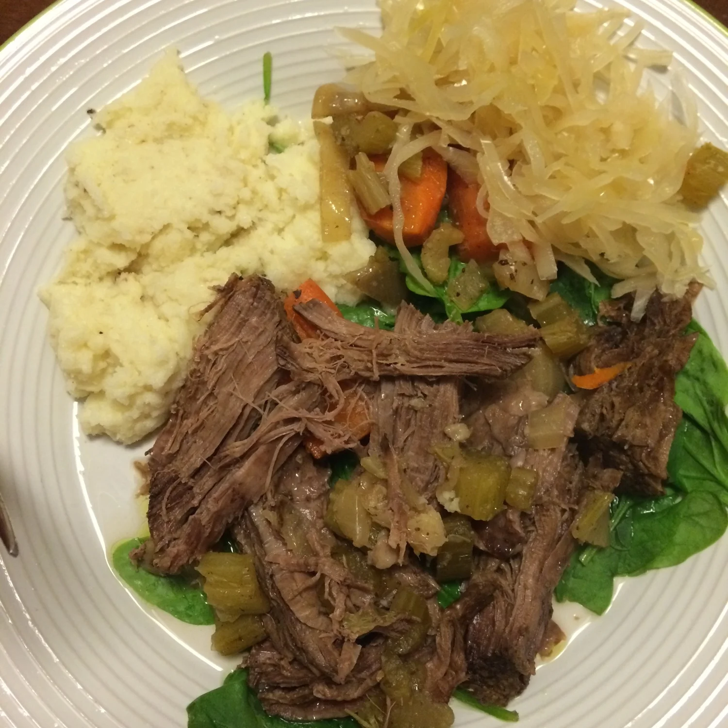 A post workout dinner might look like this: shredded slow cooked pork (protein) with cauliflower mash, carrots, kraut and spinach (all my carbs) with butter and olive oil (fat) on the veggies.