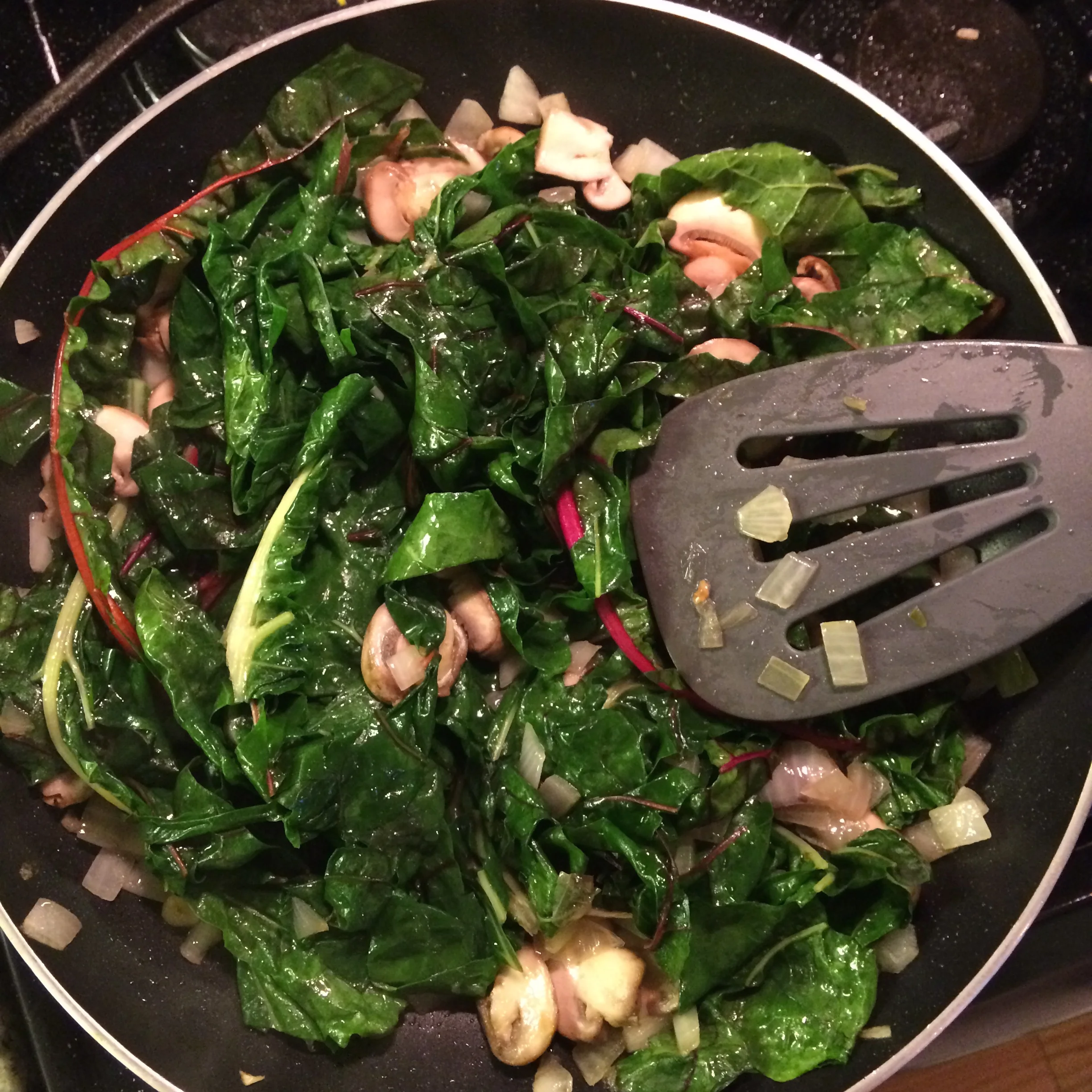 When it starts to wilt, add the spices (note: this batch didn't have bacon in it)