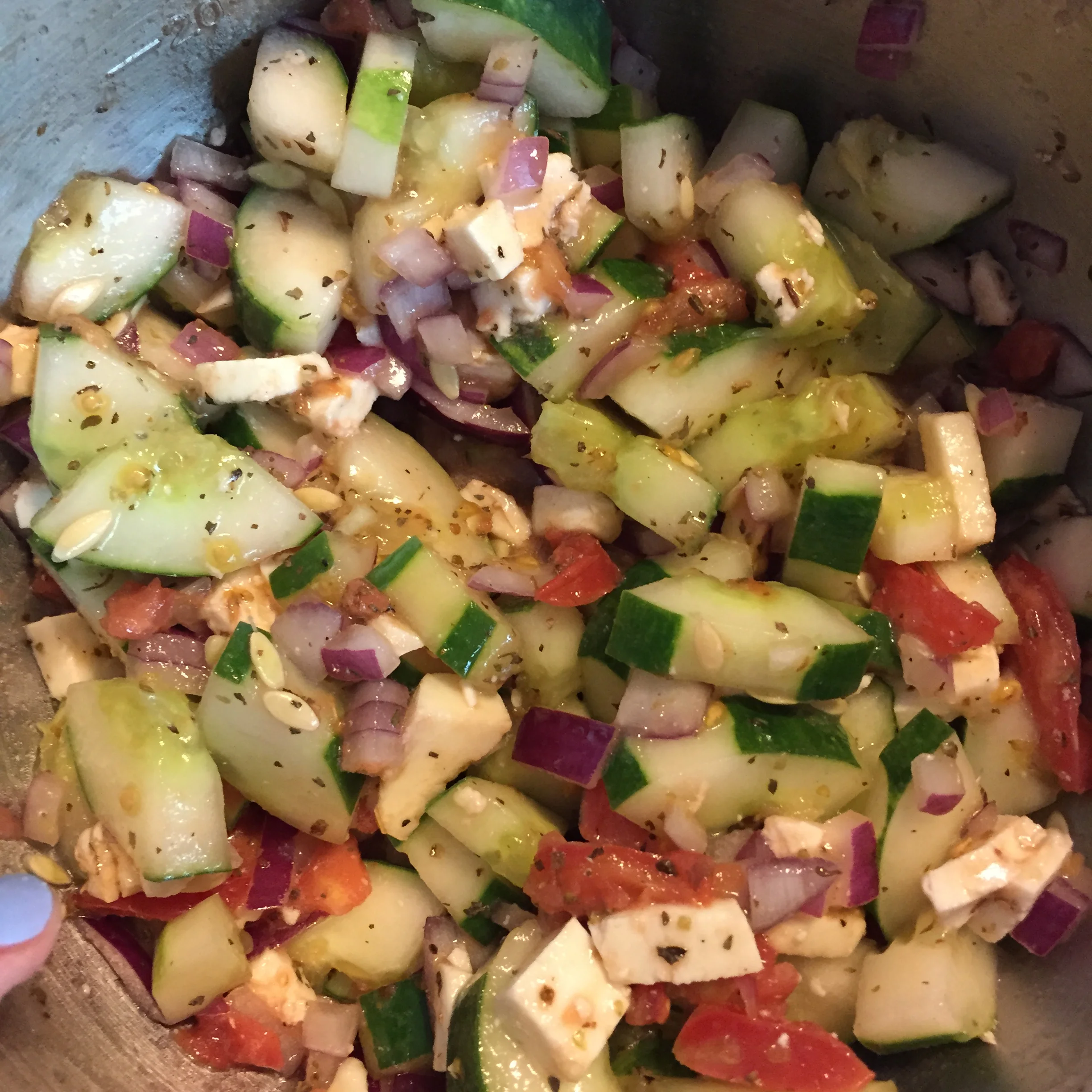 In this pictures I actually used a large mozzarella ball and chopped it up. But I prefer the taste of the smaller mozzarella balls, plus they are easier to cut.