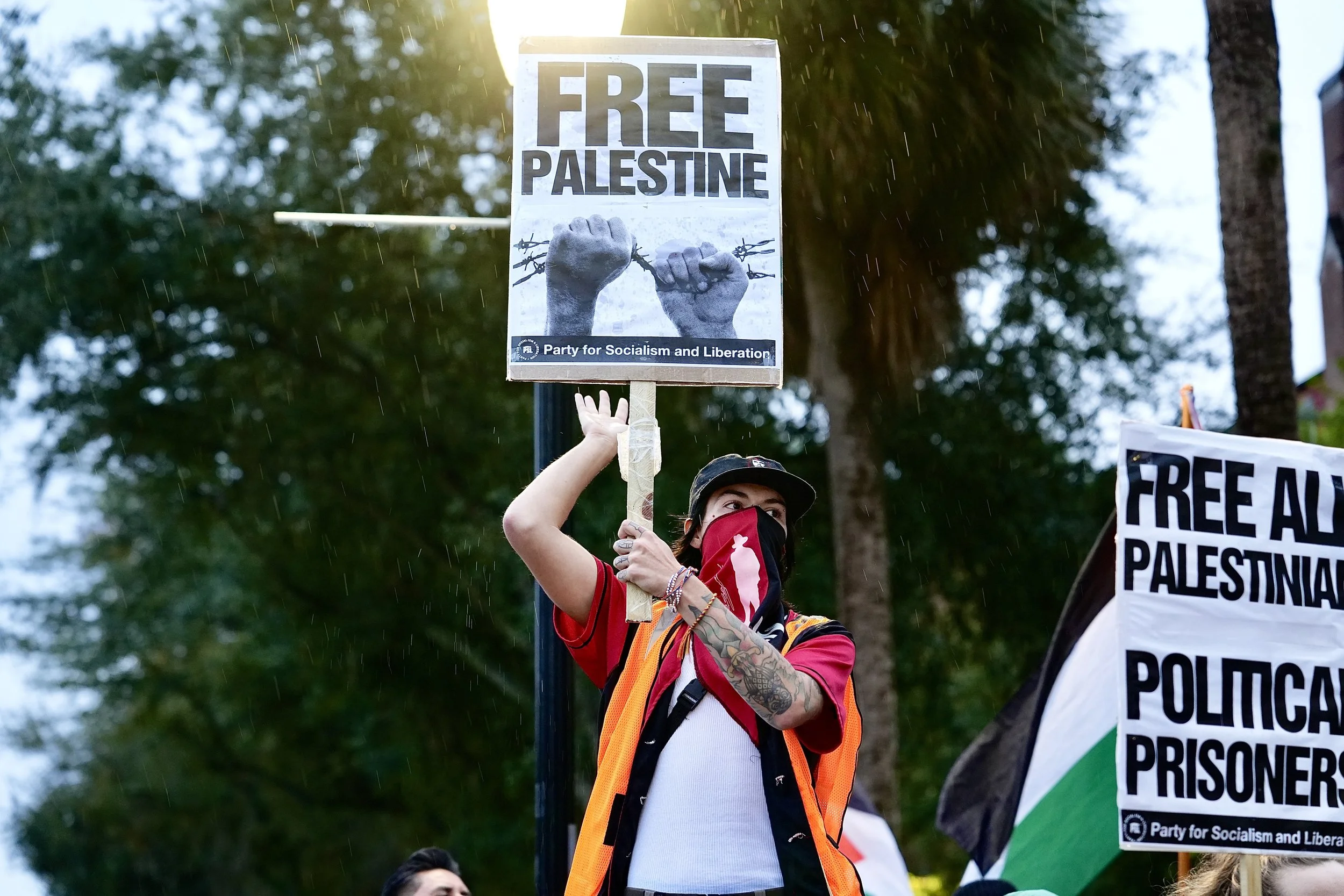 Gainesville residents and UF students gather on the corner University Avenue and 13th Street in support of Palestine on Thursday, Nov. 16, 2023.