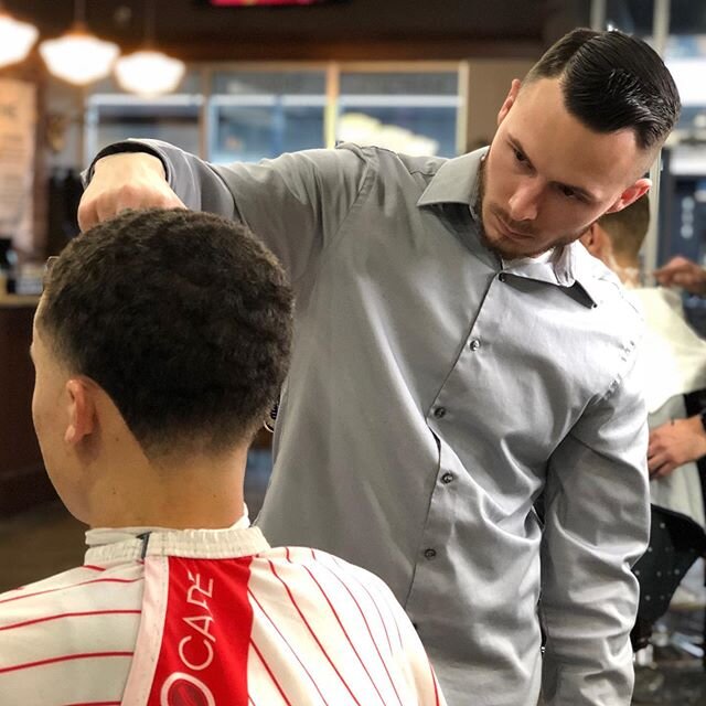 💈Action shot of the talented @a_b_thebarberrr (Alan) putting the finishing touches on a clean bald taper fade. In need of a new style or just a clean cut? Alan has the skills to work with all hair types and styles. Book online at Thronepdx.com