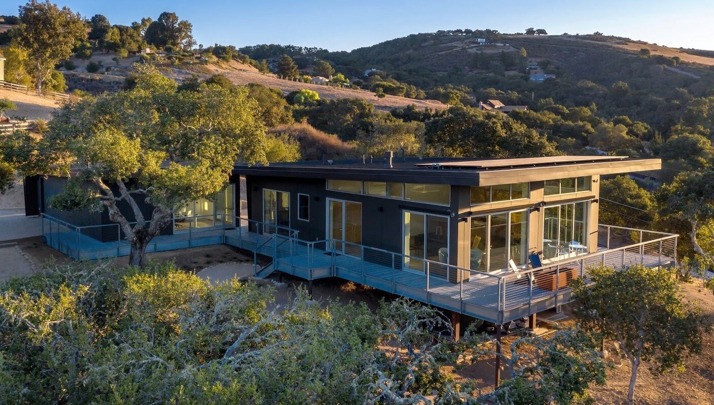 elevated-on-an-oak-studded-hillside-lot-the-three-bedroom-three-bath-waterfall-residence-overlooks-spectacular-views-in-three-directions.jpg