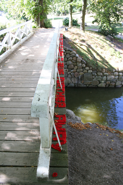 Each Step Takes Me Closer To Being Further Away, (crochet Letters on bridge, Sophienholm, 2005).