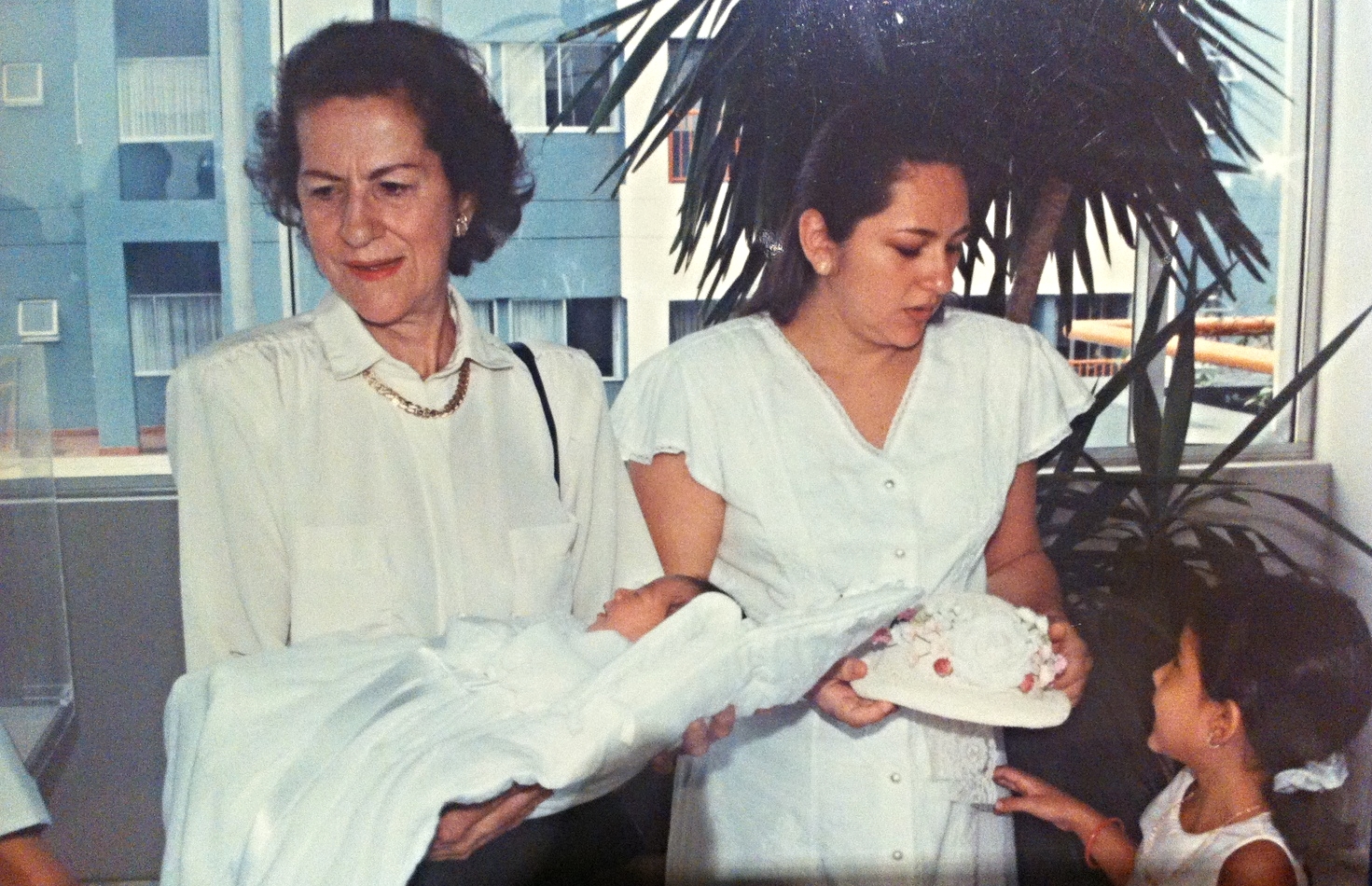 Cali, Colombia. 1998 My grandmother Nubia Hernandez, my mother Roselena Giraldo, and me at my sister Camila Vela Giraldo's baptism