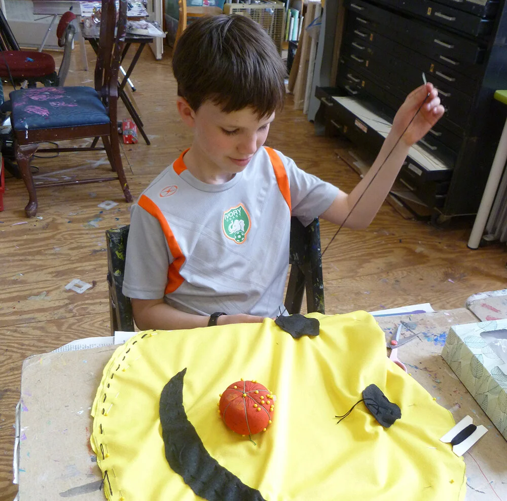 1000pxl square niko sewing.jpg