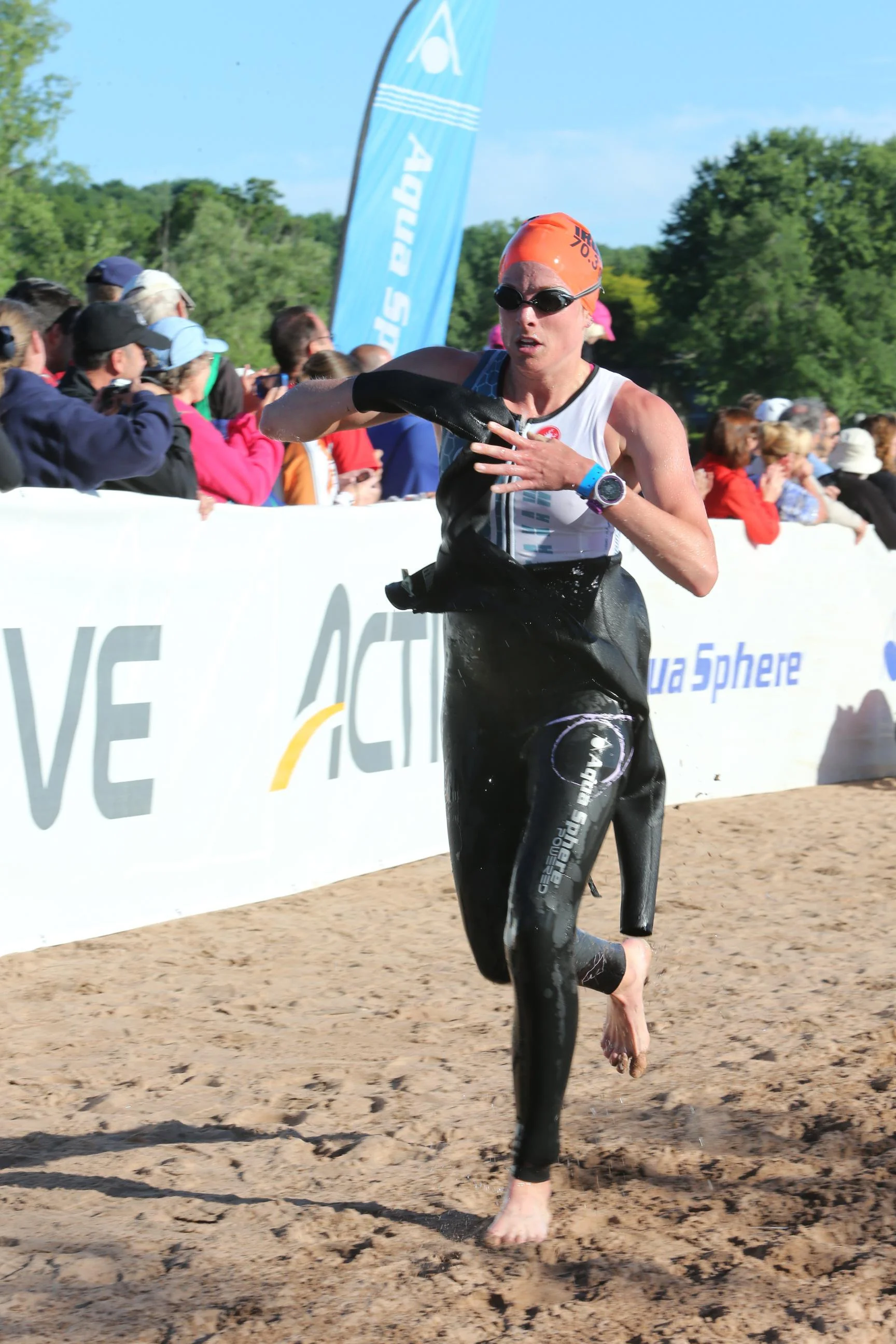 Out of the water and getting ready for a long run to T1.