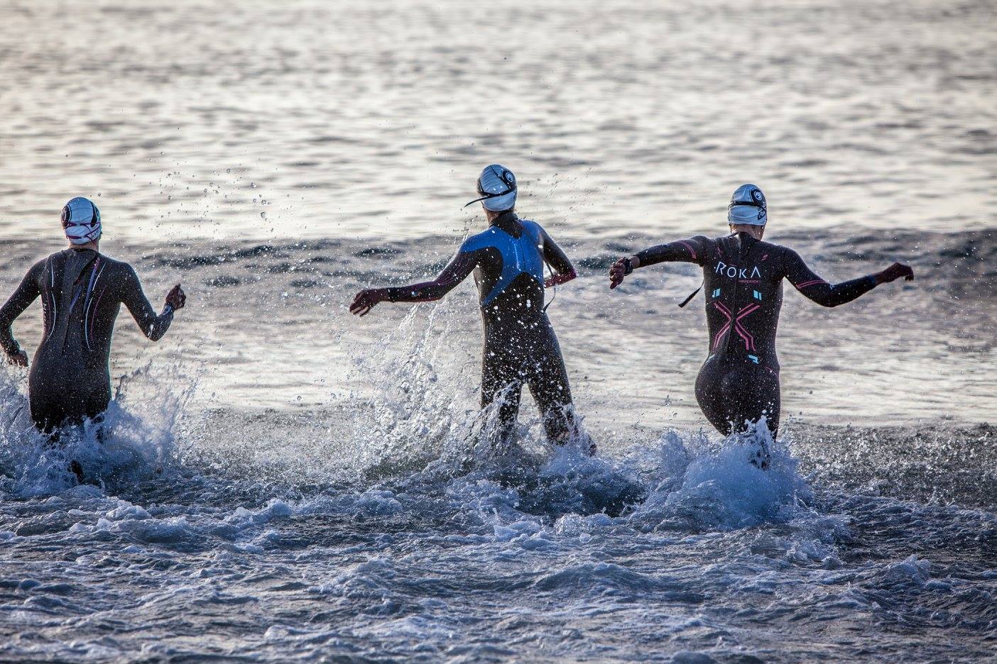 On the far left, at this point I was not concerned about looking awkward running through the waves. Photo credit: Rev3