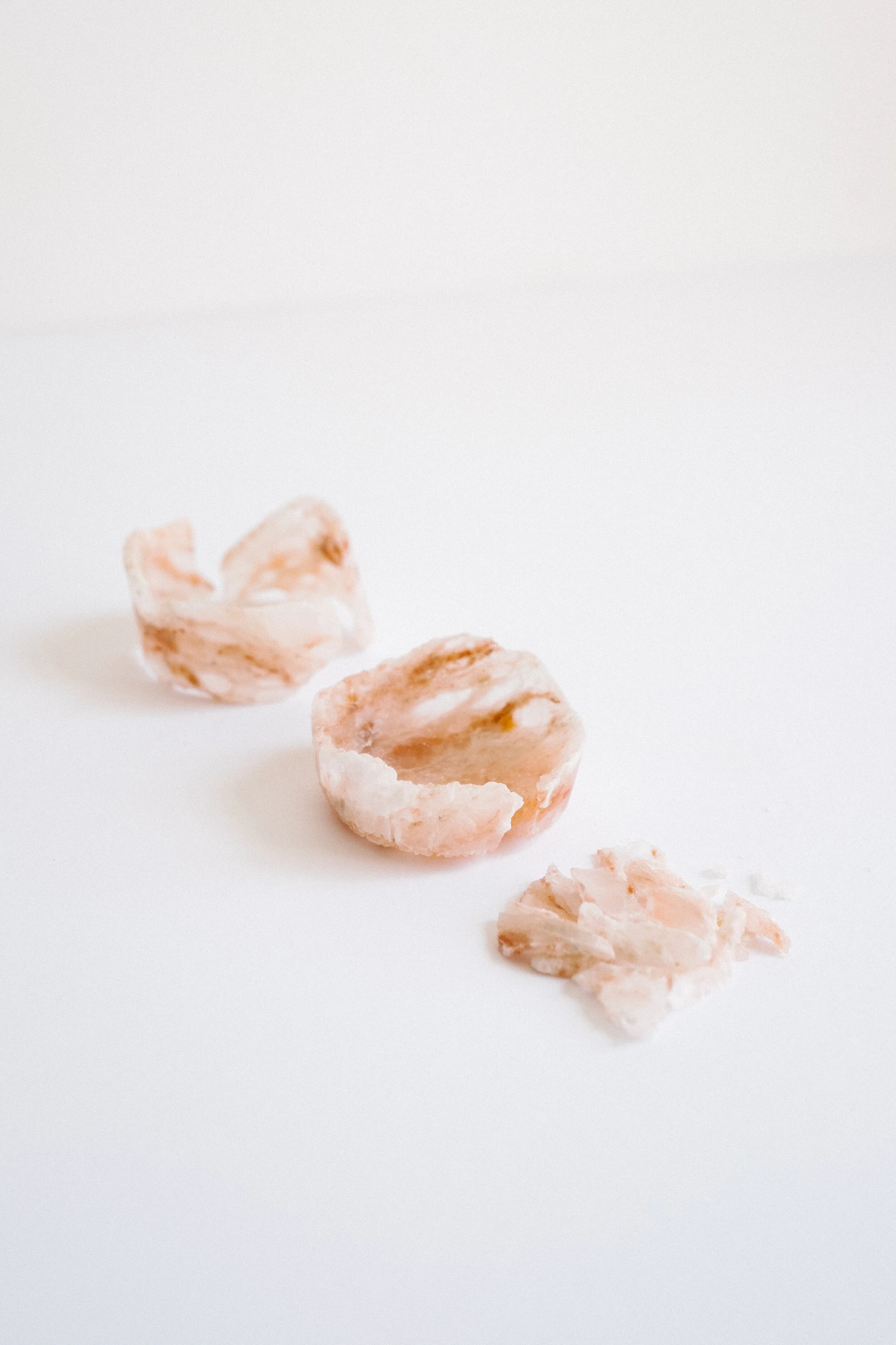 SALT CUP (OBJECT AS PHYSICAL MANIFESTATION OF DESIRE AND GRIEF) March 2018—June 2019 Handcarved pink Himalayan salt lamp 2¼ x 2½ inches + variable