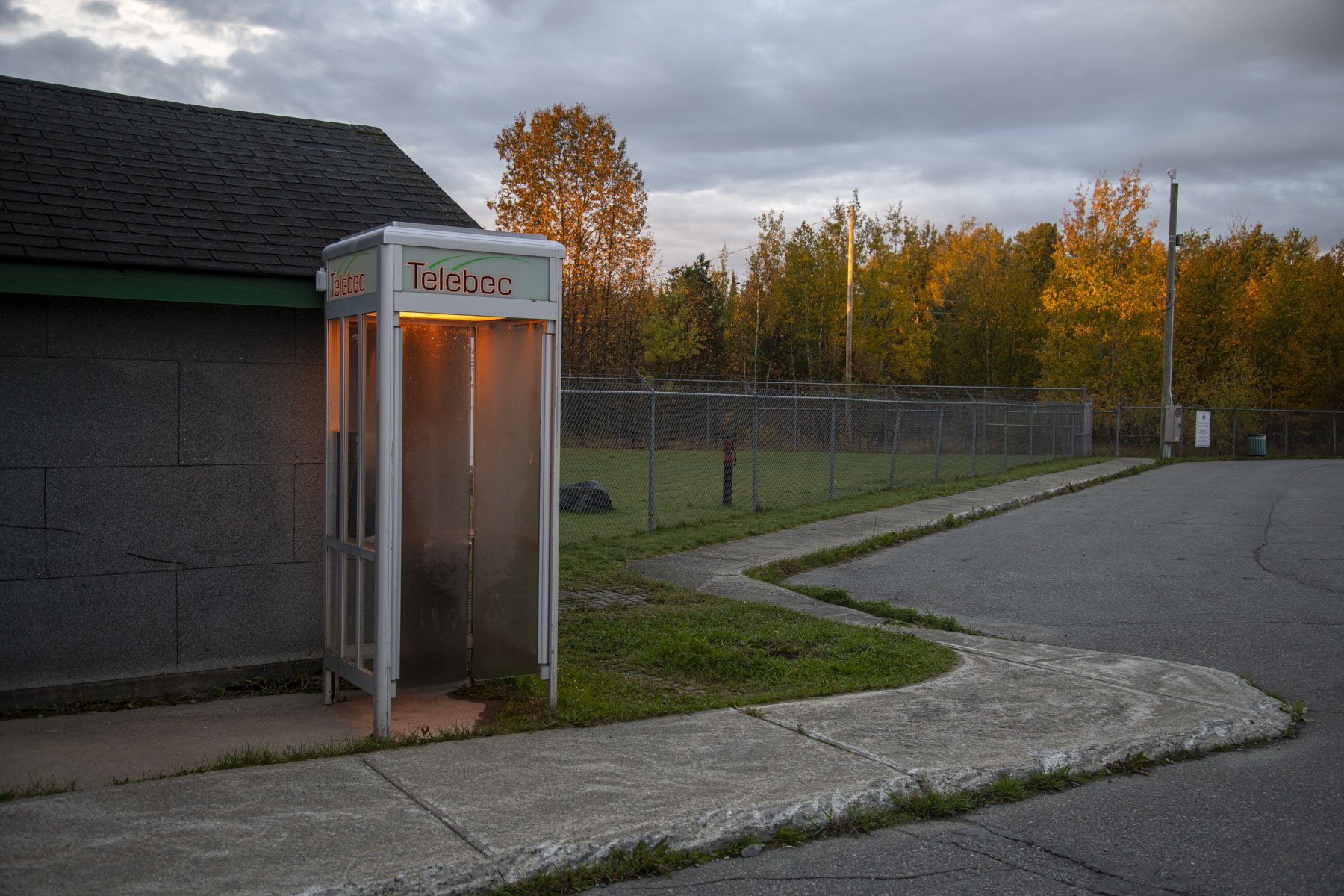  The morning sun lights up a telephone booth at the entrance of the former Lamaque mine. Maintaining and upholding a national historic site, like the mining village of Bourlamaque and La Cité de l’Or, is a reminder that preserving the past is not a s