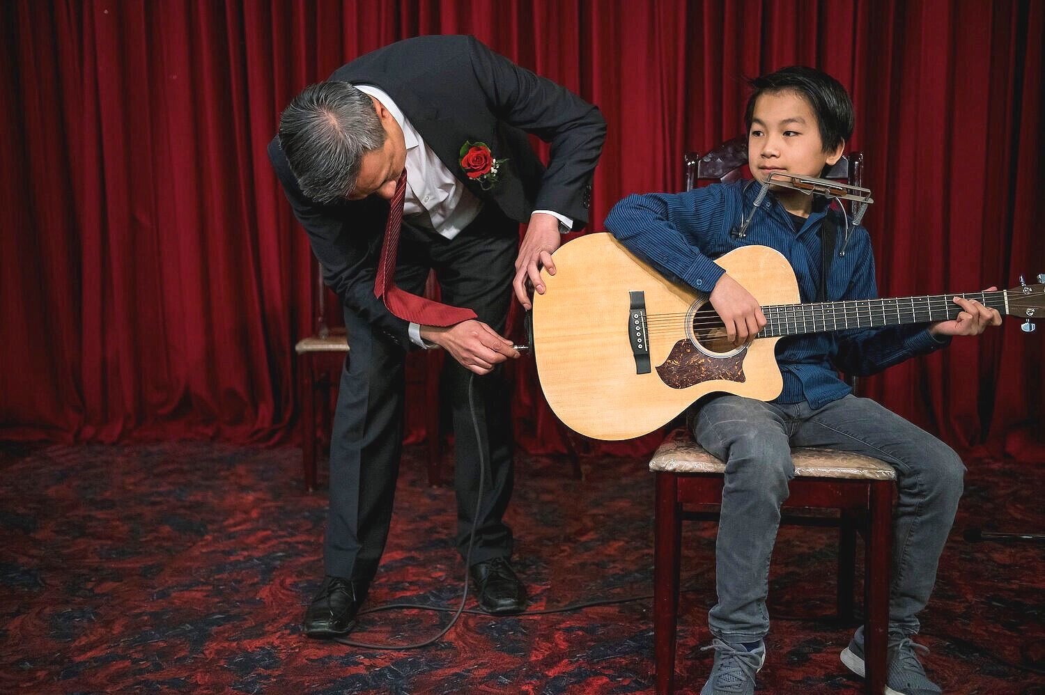  James Yee checks his son’s guitar before his performance of Bohemian Rhapsody by Queen during a family event. The young generation of Chinese Canadians are increasingly exposed and influenced by western culture. Therefore, more young Chinese study w