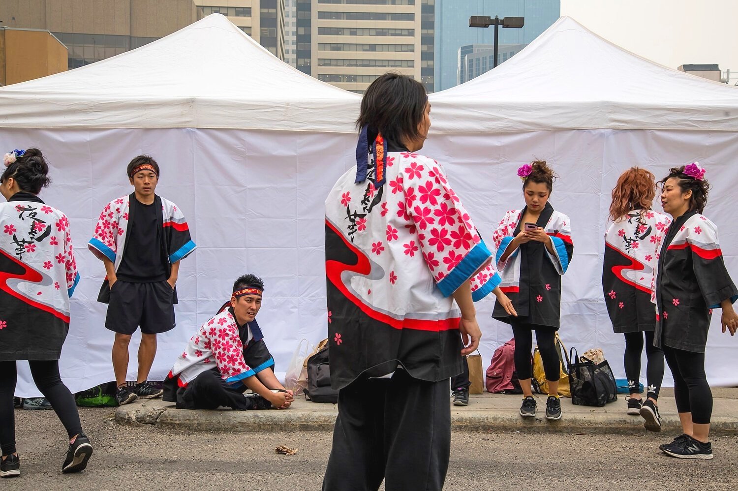  Japanese dancers prepare before performing at the Chinese Street Festival in Calgary. Chinatown helps different Asian associations to work together in promoting cultural diversity; a sentiment not always echoed in the past, especially during WWII wh