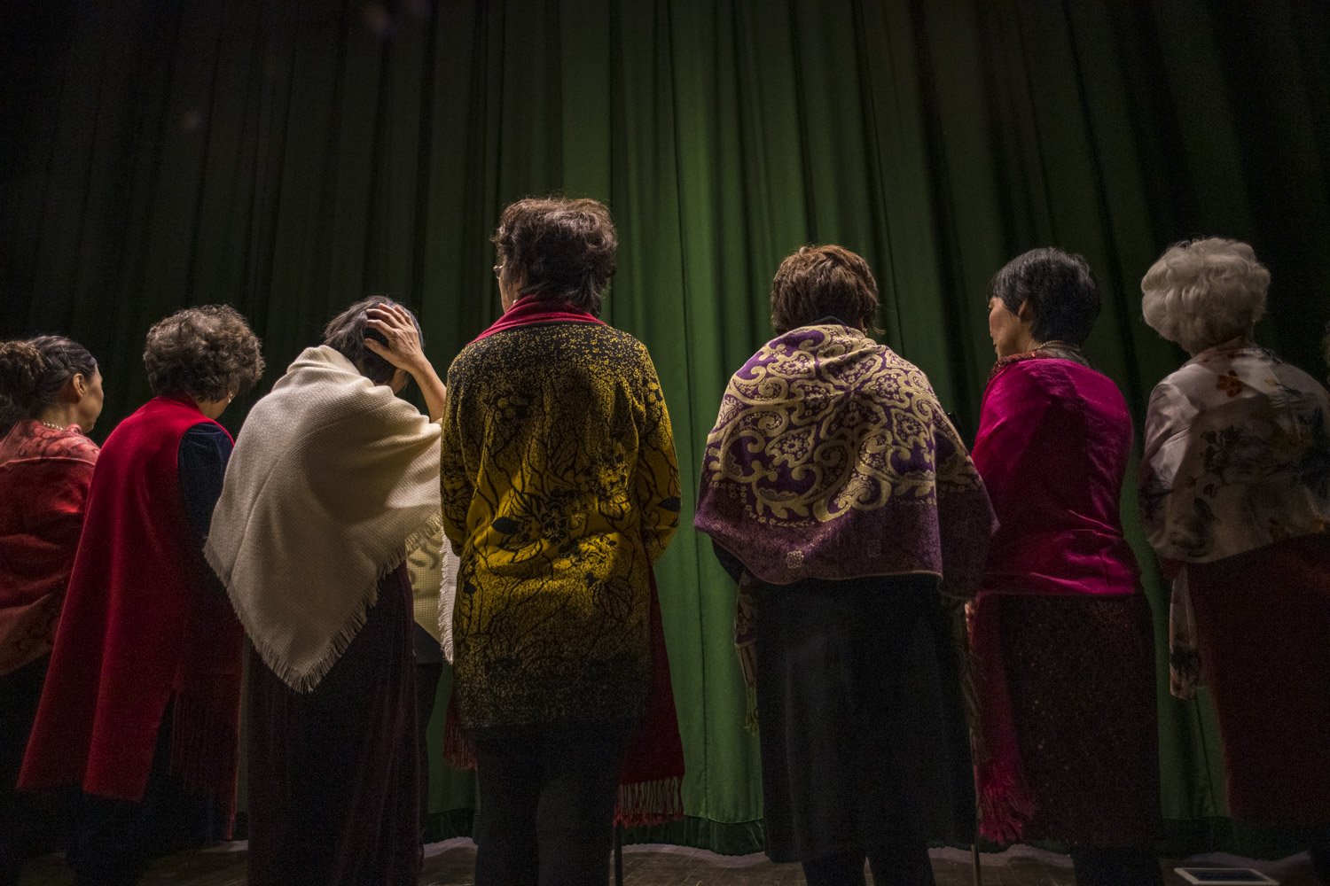  Women get ready backstage before a performance  during a Chinese New Year concert  at the Calgary Chinese Cultural Centre. 