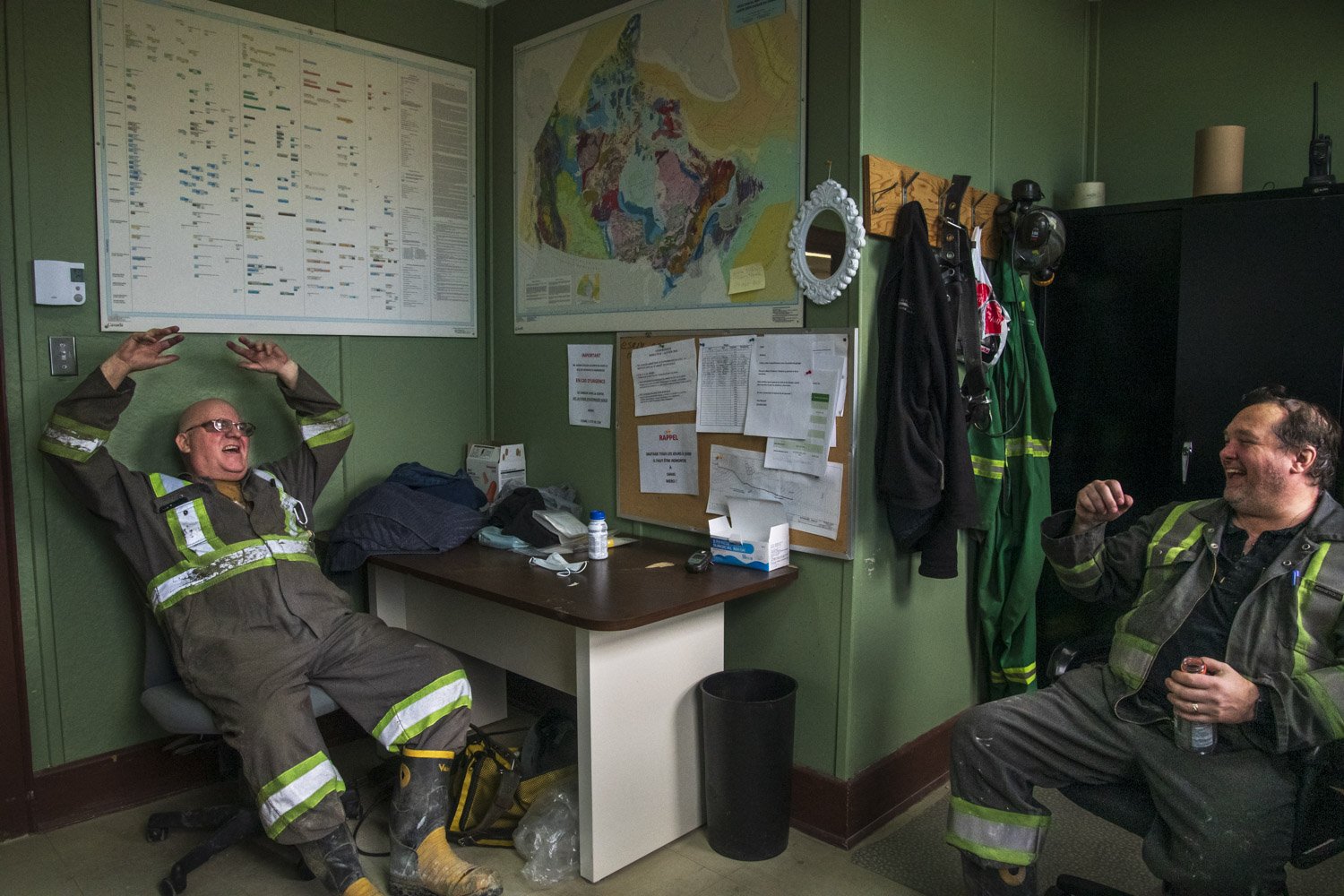  Retired miners Rene Caron and Serge Frenette (right) chat during their lunch break inside an office building of the former Lamaque mine. The mine changed its name to “La Cité de l’Or” when it was converted into an underground tourist attraction in t