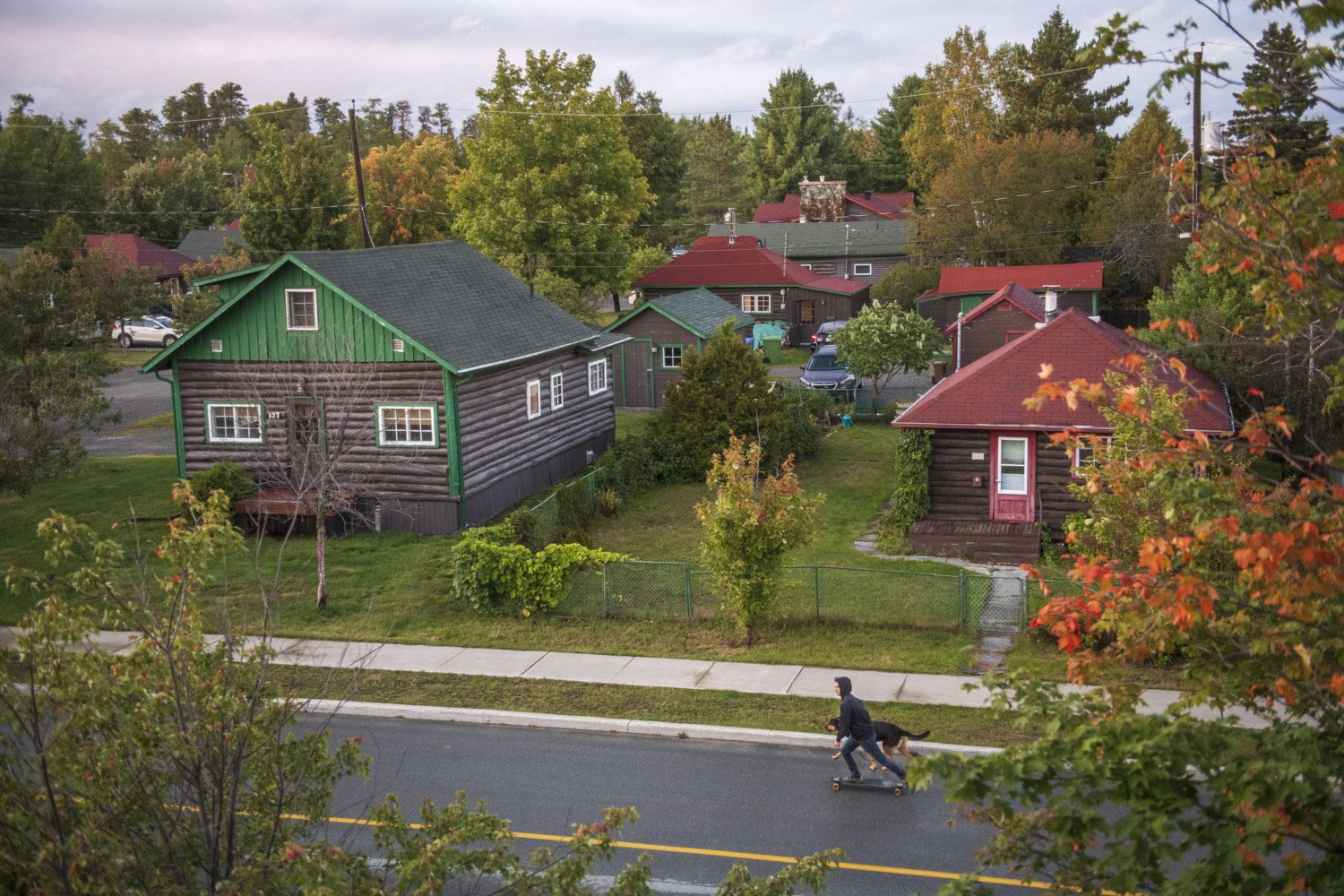  Built in the 1930s, the 22-hectare former company town exhibits unique features such as an orthogonal layout plan, residential land-use based on social hierarchy, and distinct pine log style architectures.  Since 1968, the village has become a neigh