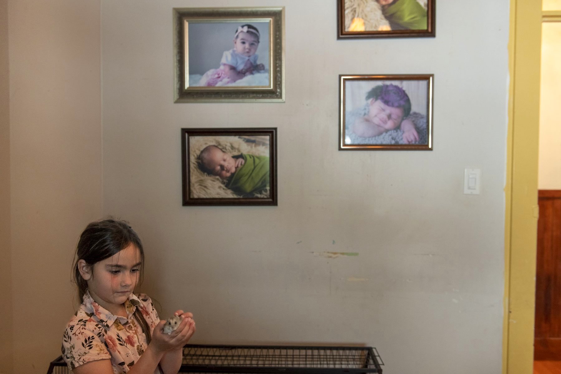  Charlye Paradis with her hamster Amunch at her home in the mining village of Bourlamaque. Her family’s bed and breakfast is the only original remaining business in the neighbourhood. The bed and breakfast was named “l’Orpailleur” a french word meani