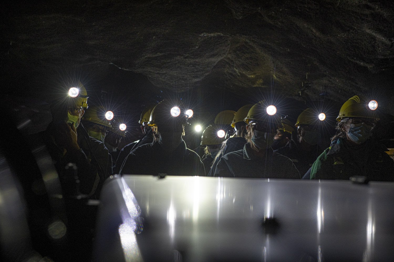  The light from visitor’s headlamps illuminate an underground tunnel leading to the former Lamaque mine. Tourists can visit sections of the mine to depth of more than 100 meters. 