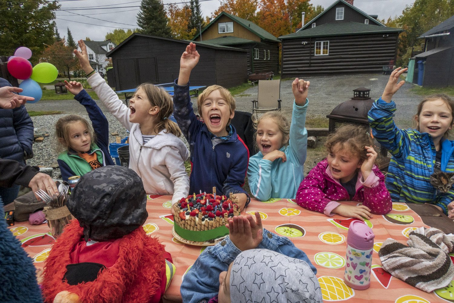  Kids celebrates at an outdoor birthday party in the mining village of Bourlamaque. After the mine closed in 1985 more families with incomes not tied to the Lamaque mine or the mining industry moved into the historic neighbourhood. 