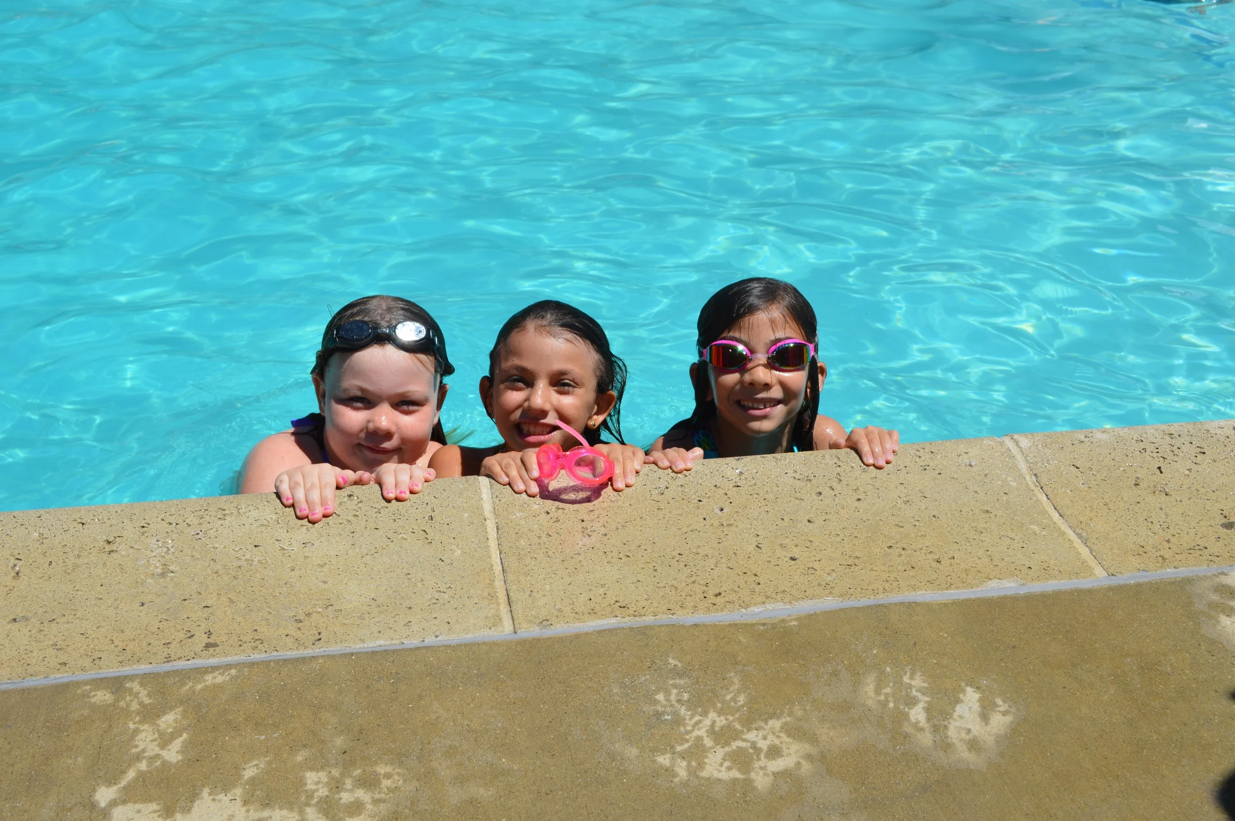 (Learn more about our pool and swimming at camp here .)