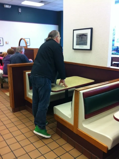 man looking at photo.jpeg