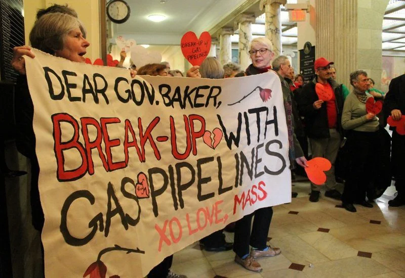 Valentine's Day message from advocates at the MA state house outside Governor Baker's office. Photo Credit: Gloucester Times .