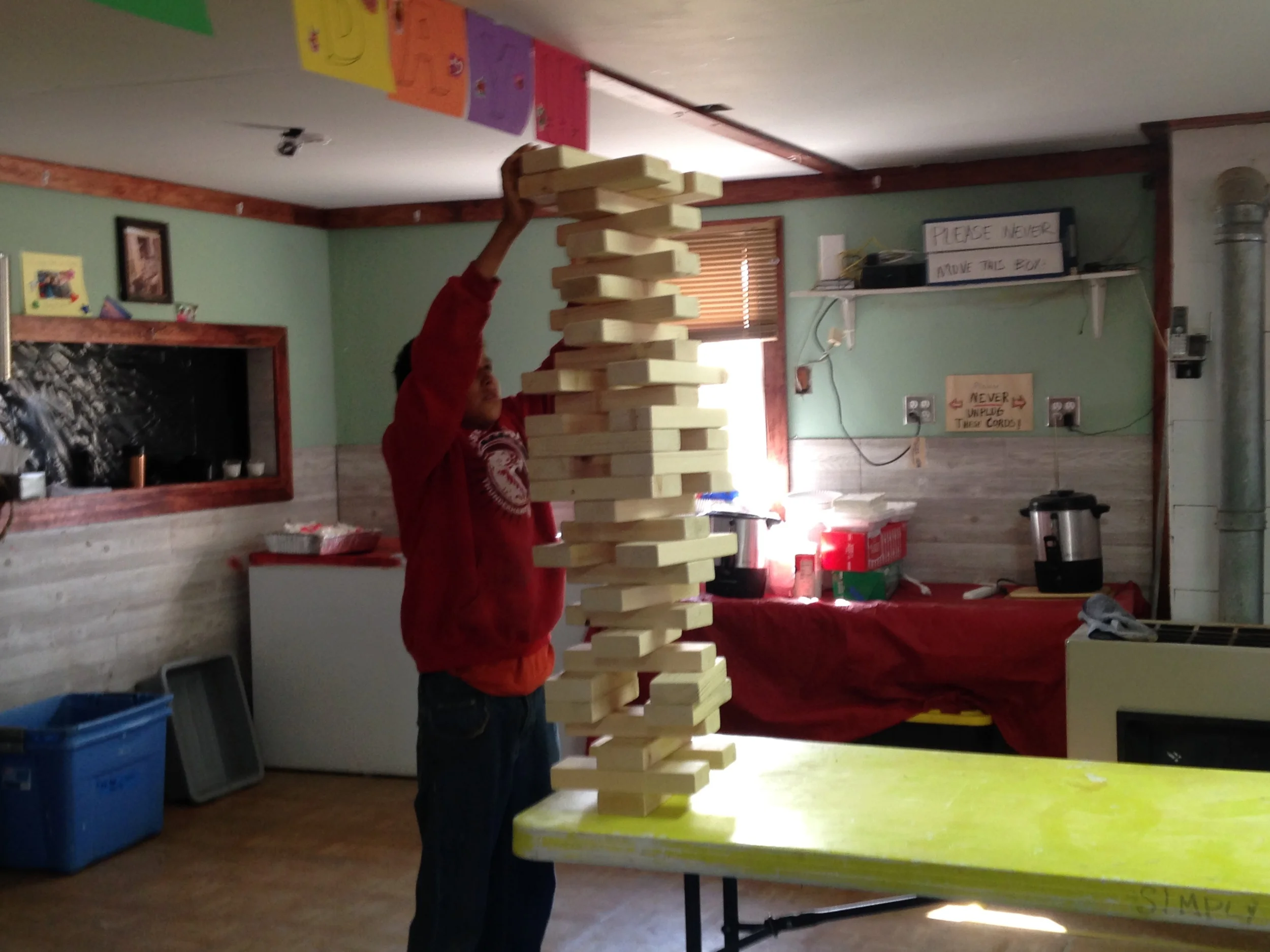 Balancing act: The life-size Jenga game required concentration...and lots of deep breaths from participating campers!