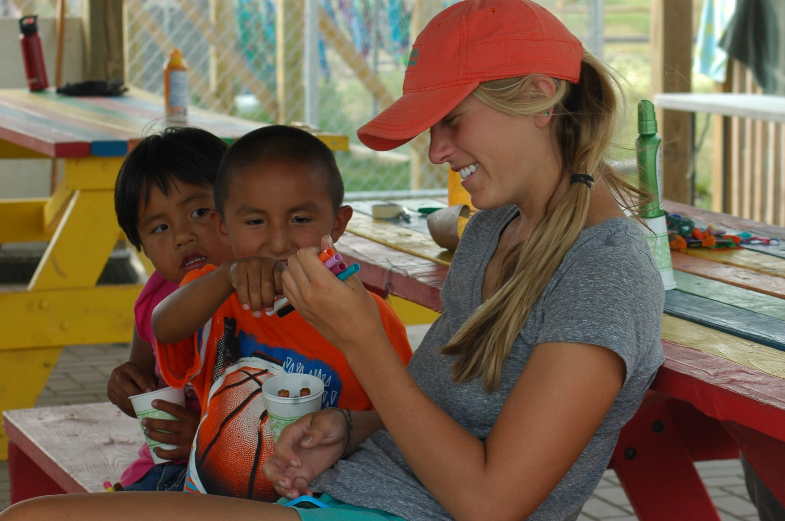 Emma, having fun with the kids at camp on the Reservation. (August 2014)