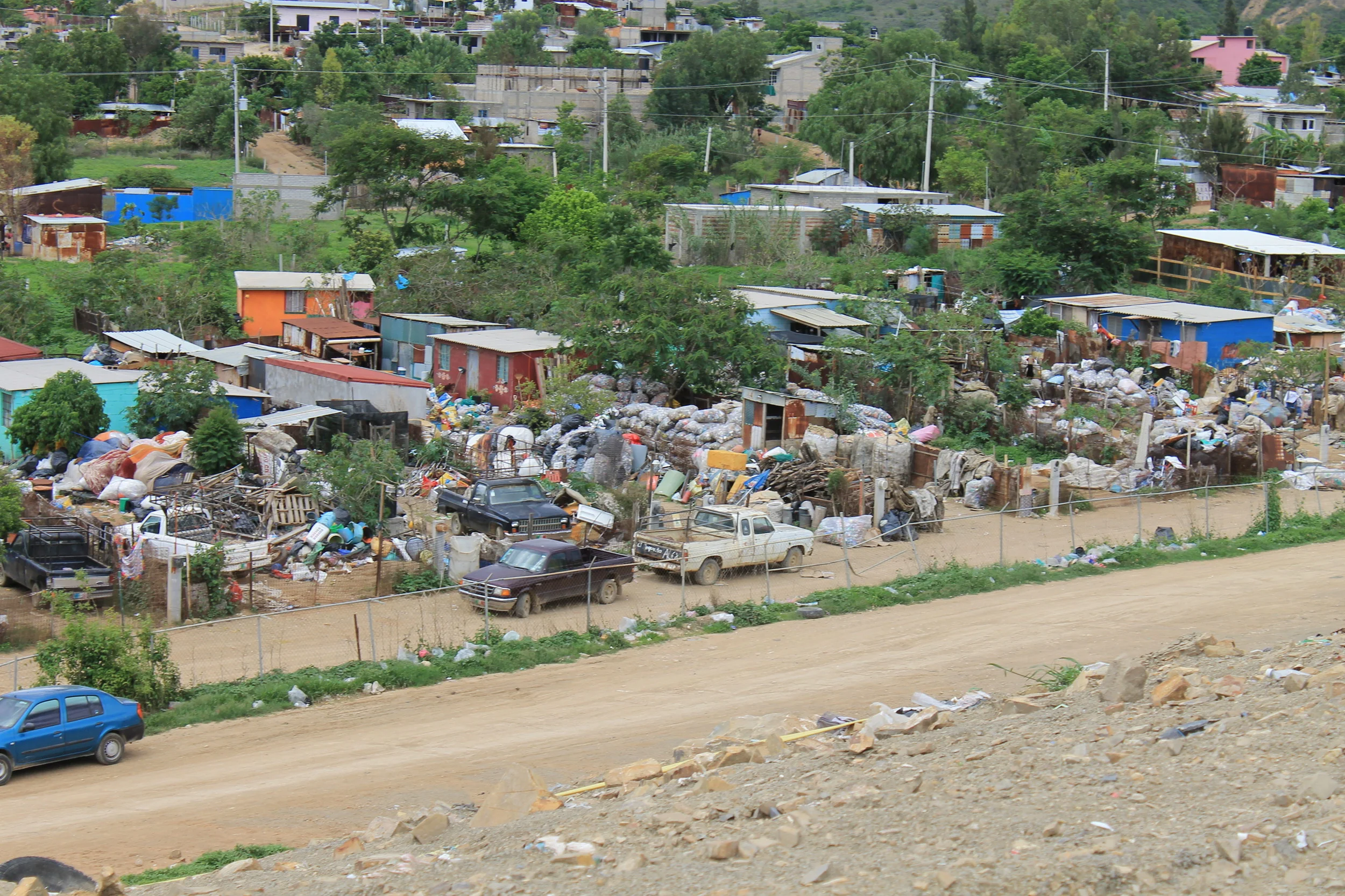 A view of some of the 27 brightly colored homes that Simply Smiles has built in the barrio within the Oaxaca City garbage dump.