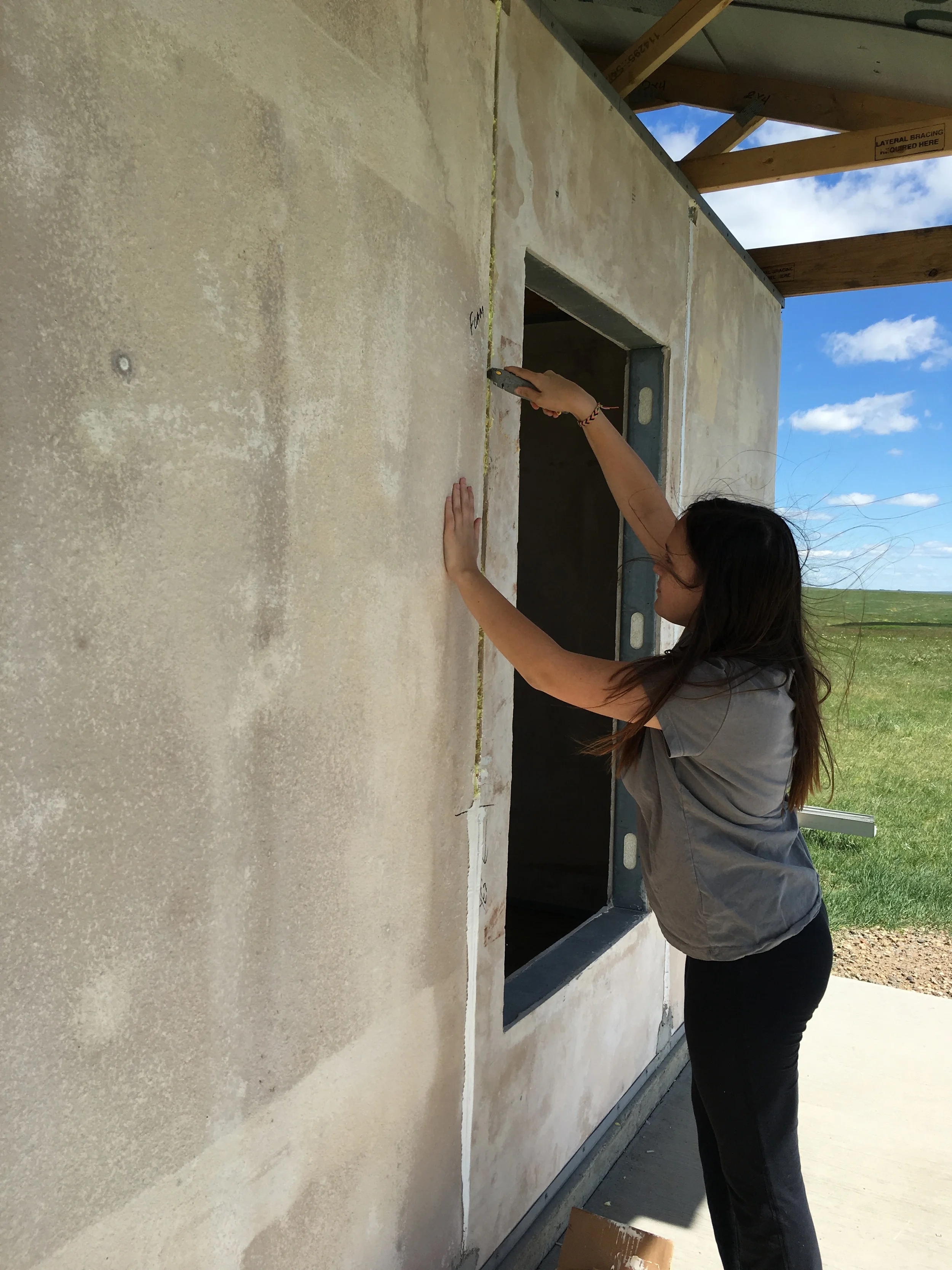 A tight seal of caulk goes on our new home!