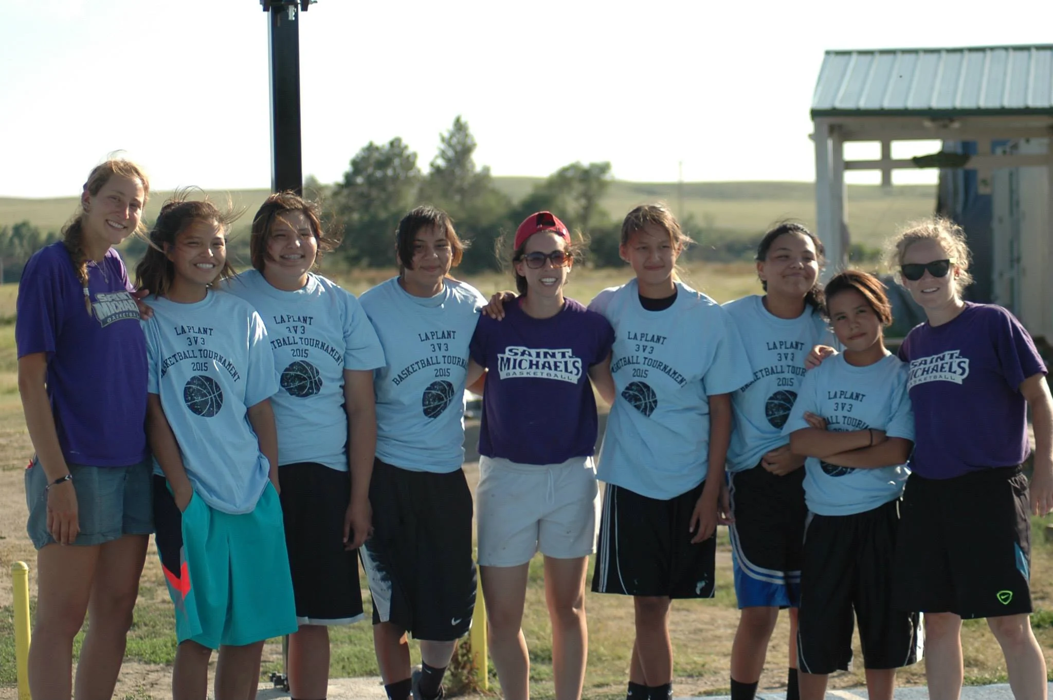 Teamwork makes the dreamwork: Sam and her former college basketball teammates from Saint Michael's College in Vermont worked with teens on the Reservation to host a basketball tournament.