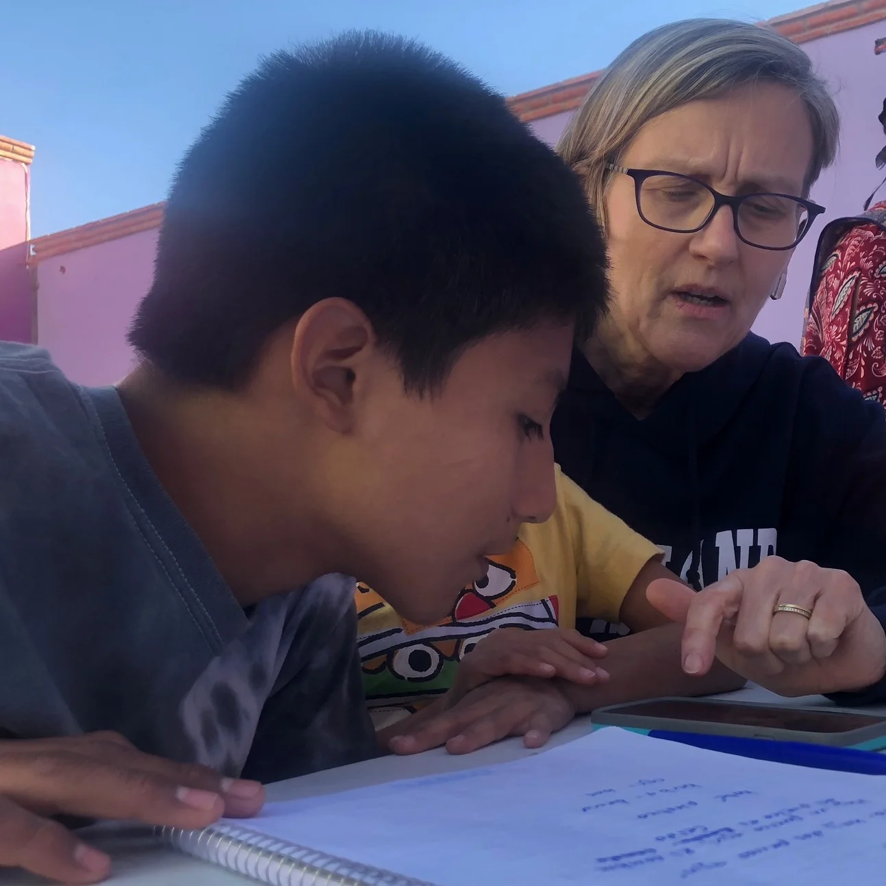 Simply Smiles Volunteer Betsy Van Loon sharing some pictures, working with the kids at our children’s home on some homework, and learning some Spanish in the process!