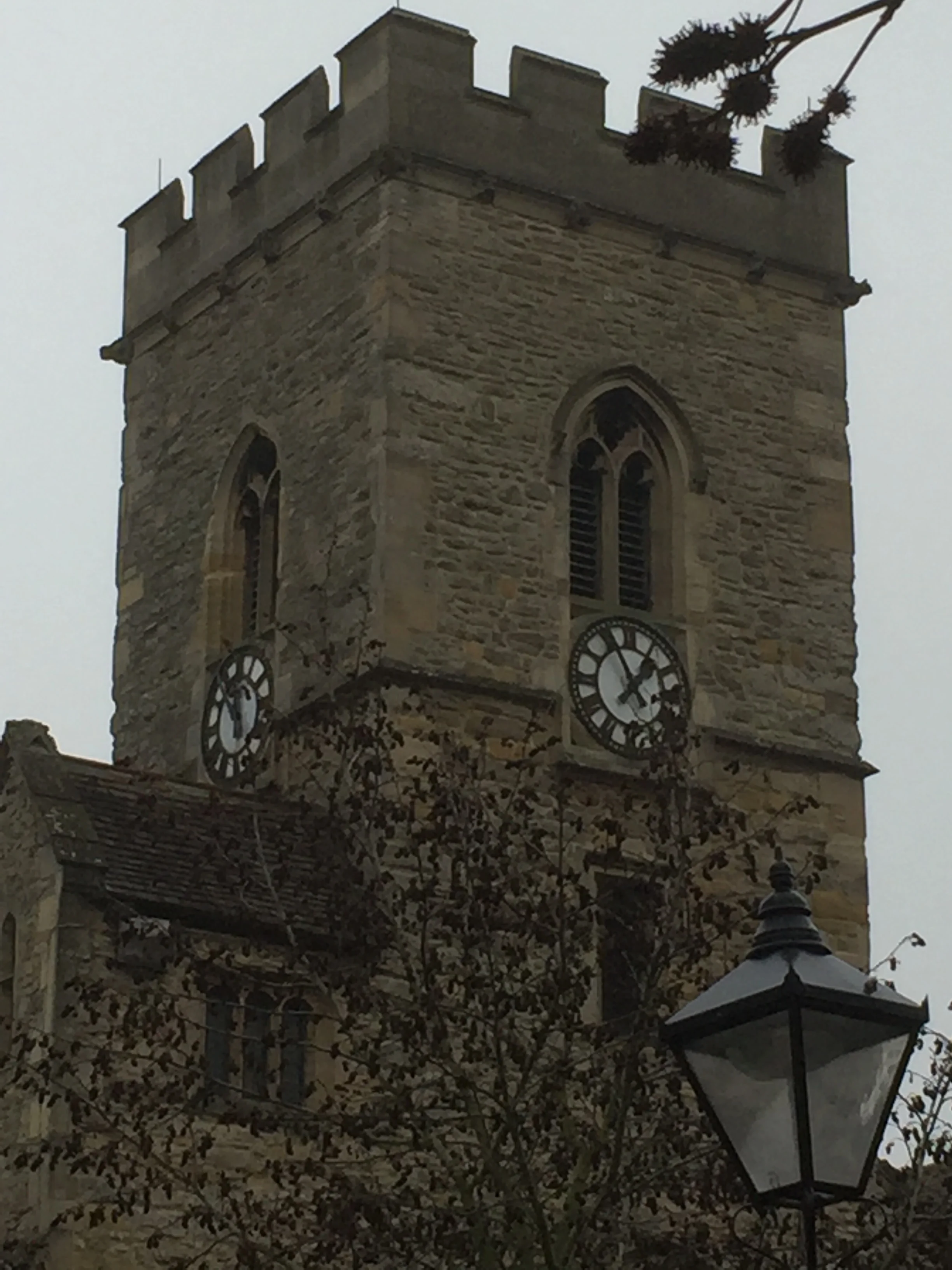 Clock faces of St Nicolas Church, Abingdon, showing sifferent times