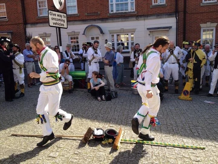 Abingdon Morris perform their broom dance