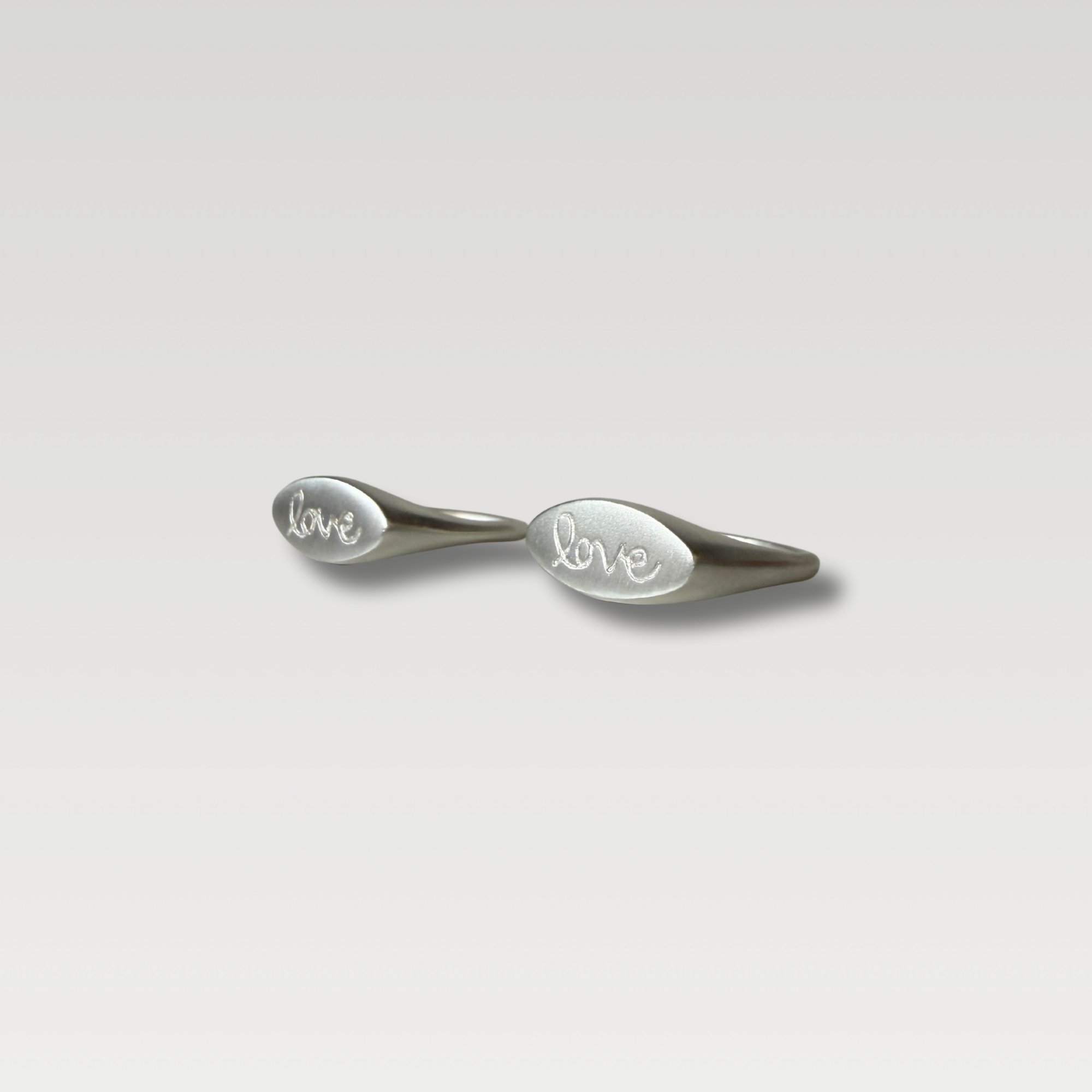 Erin DeLuca Jewelry love signet rings.jpg
