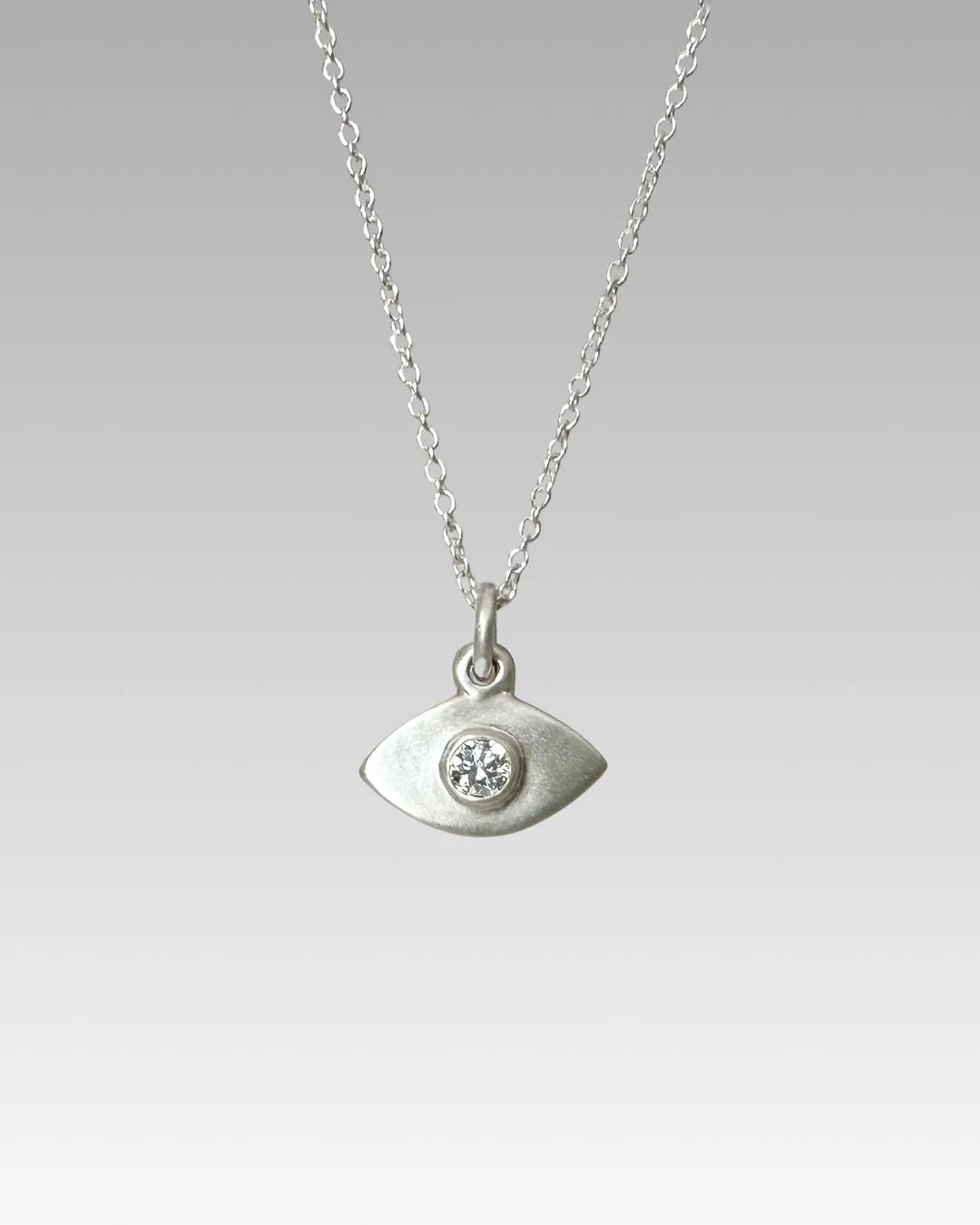 Erin DeLuca Jewelry diamond silver evil eye pendants