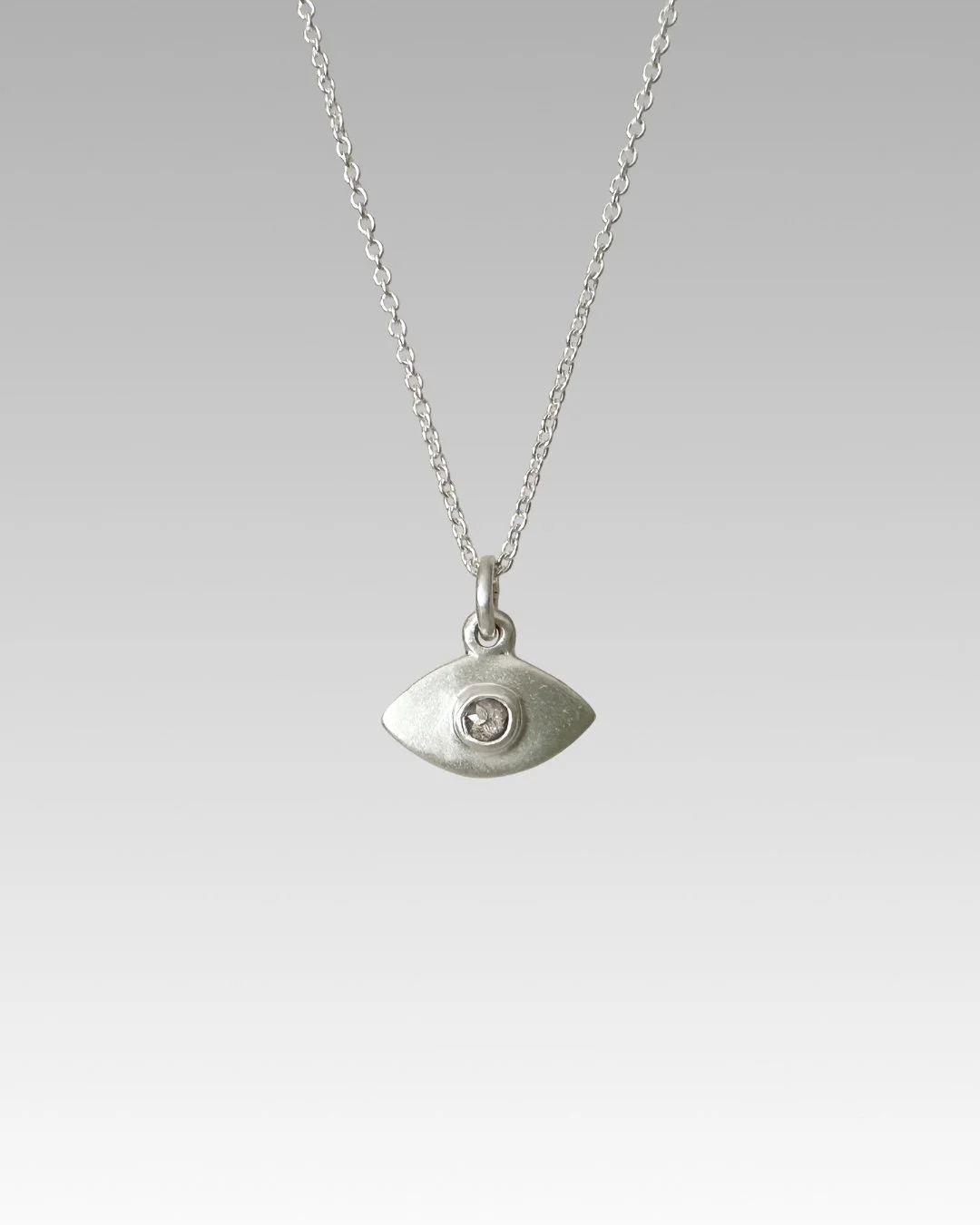 Erin DeLuca Jewelry diamond silver evil eye pendants