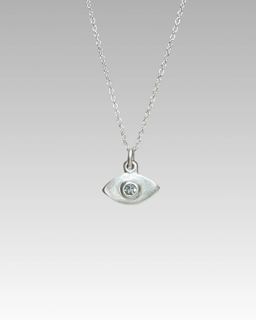 Erin DeLuca Jewelry aquamarine silver evil eye pendants