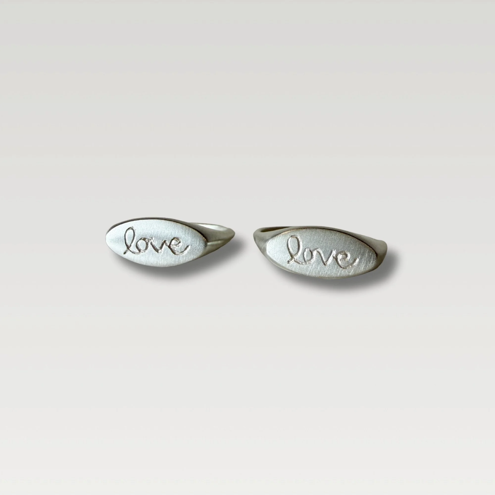 Erin DeLuca Jewelry love signet rings.jpg
