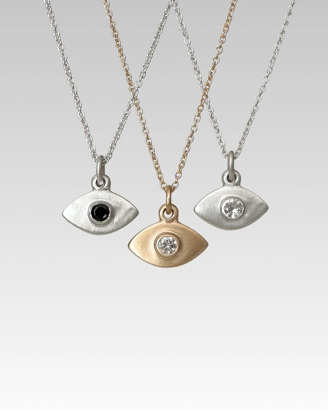 14K and Silver Evil Eye Pendants
