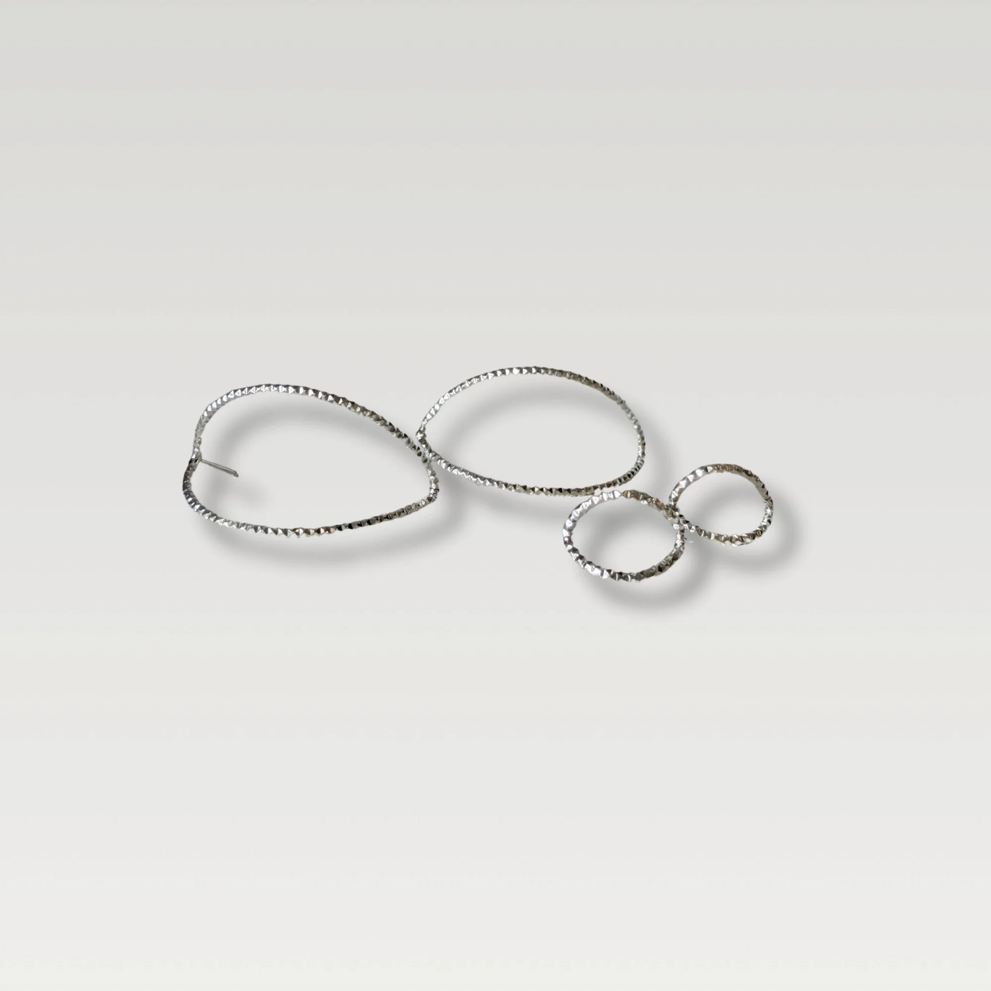 Erin DeLuca Jewelry small petal studs.jpg