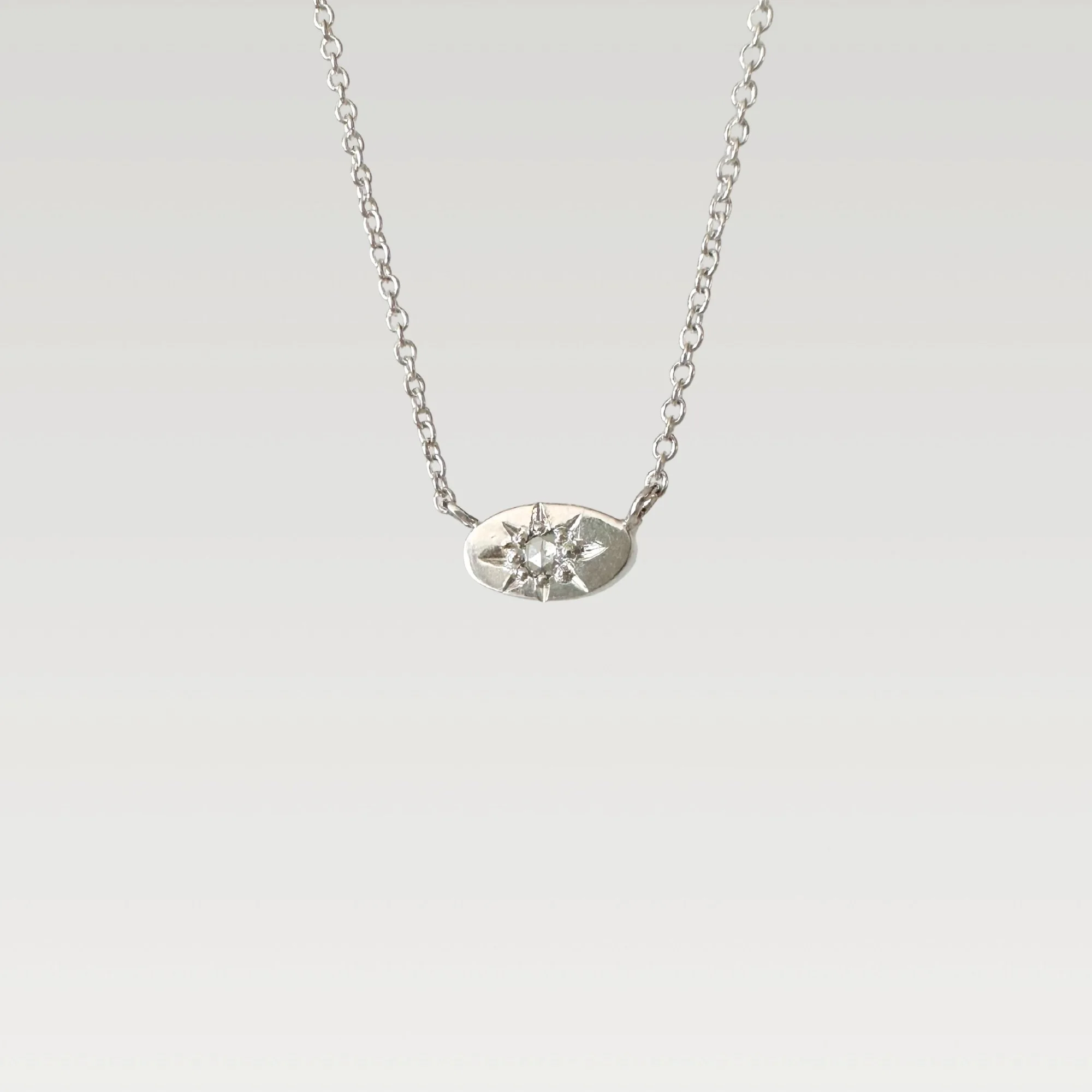 Oval Diamond Starburst Pendant