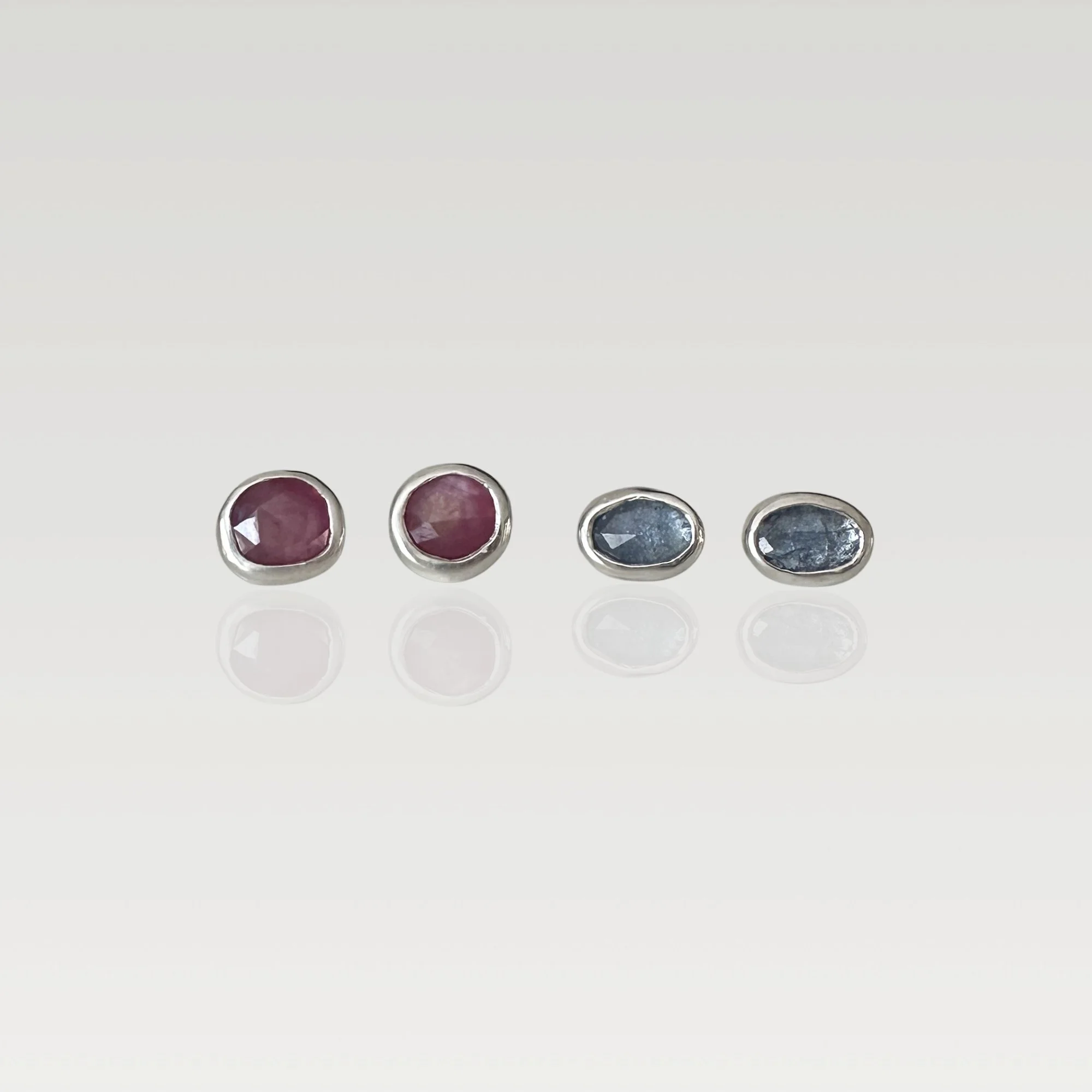 Erin DeLuca Jewelry Winter 25 ruby and tanzanite stud earrings.jpg (Copy)