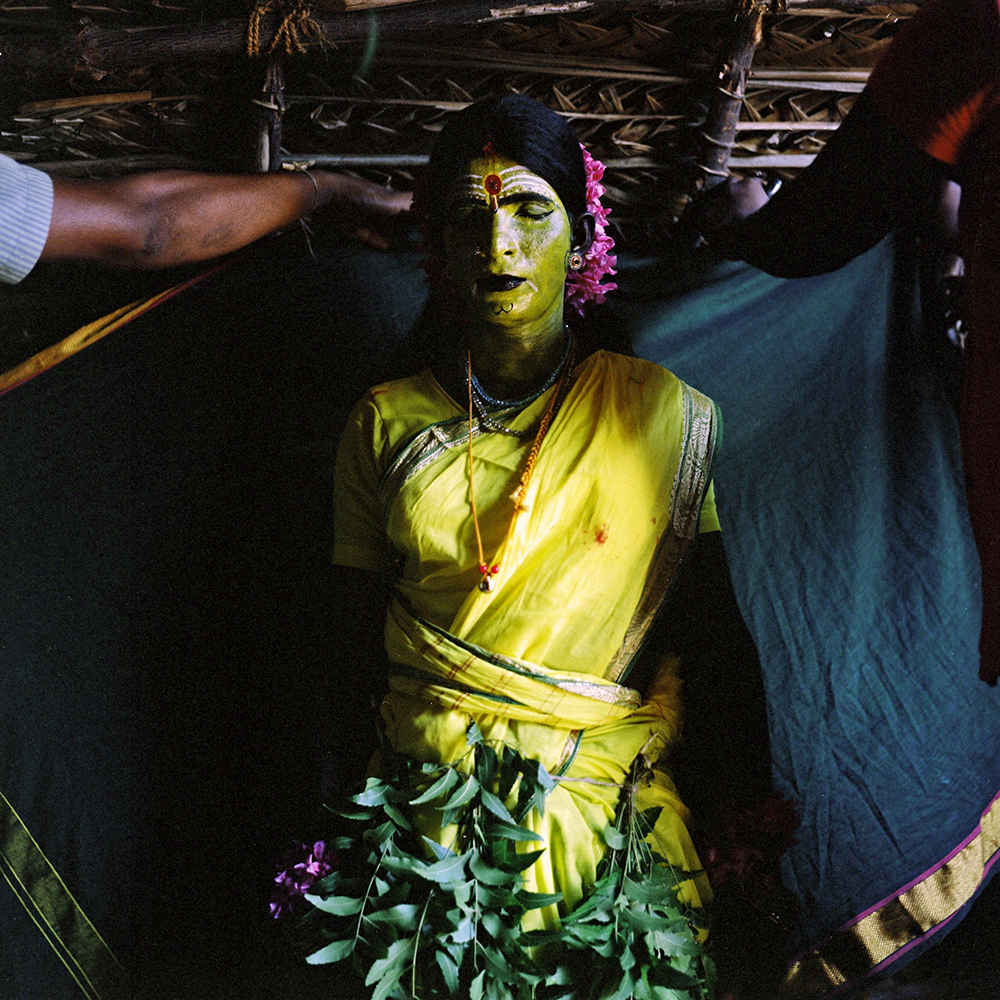   Jagada Guru, a kothi from Devanapattinam, prepares to play the goddess Amman in the Mayanakollai festival, which was put on in Devanapattinam by a group of people, which included several kothis. March 2013.&nbsp;  