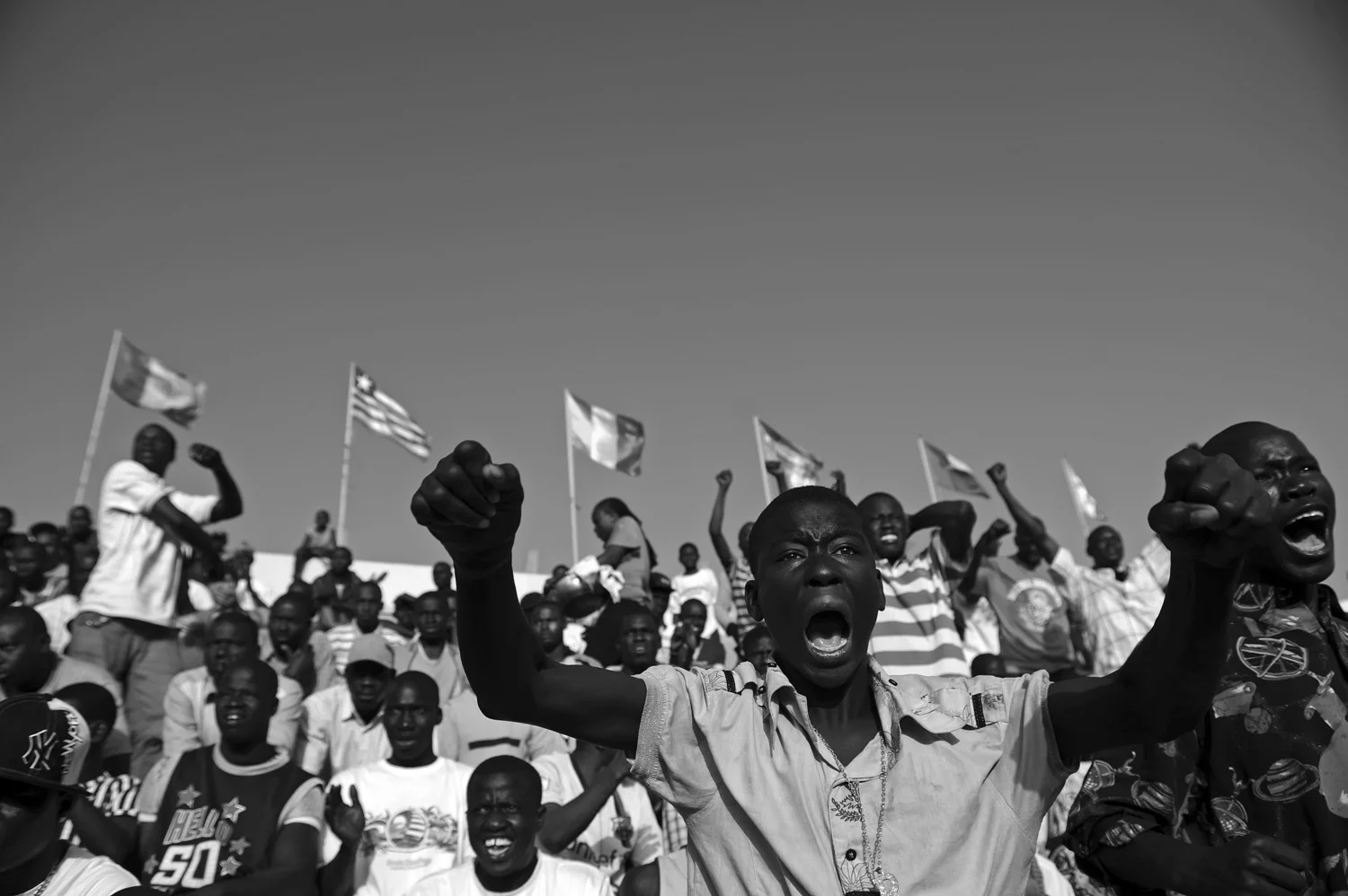 A crowd cheers during a wrestling match in Dakar, Senegal.