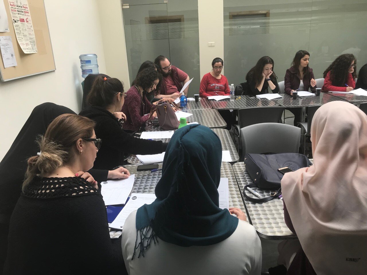 Participants at an Inclusion Training attend a presentation