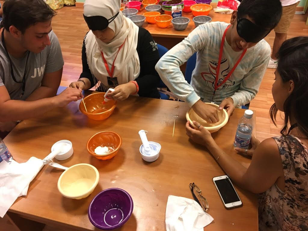 volunteers and participants work together during activity