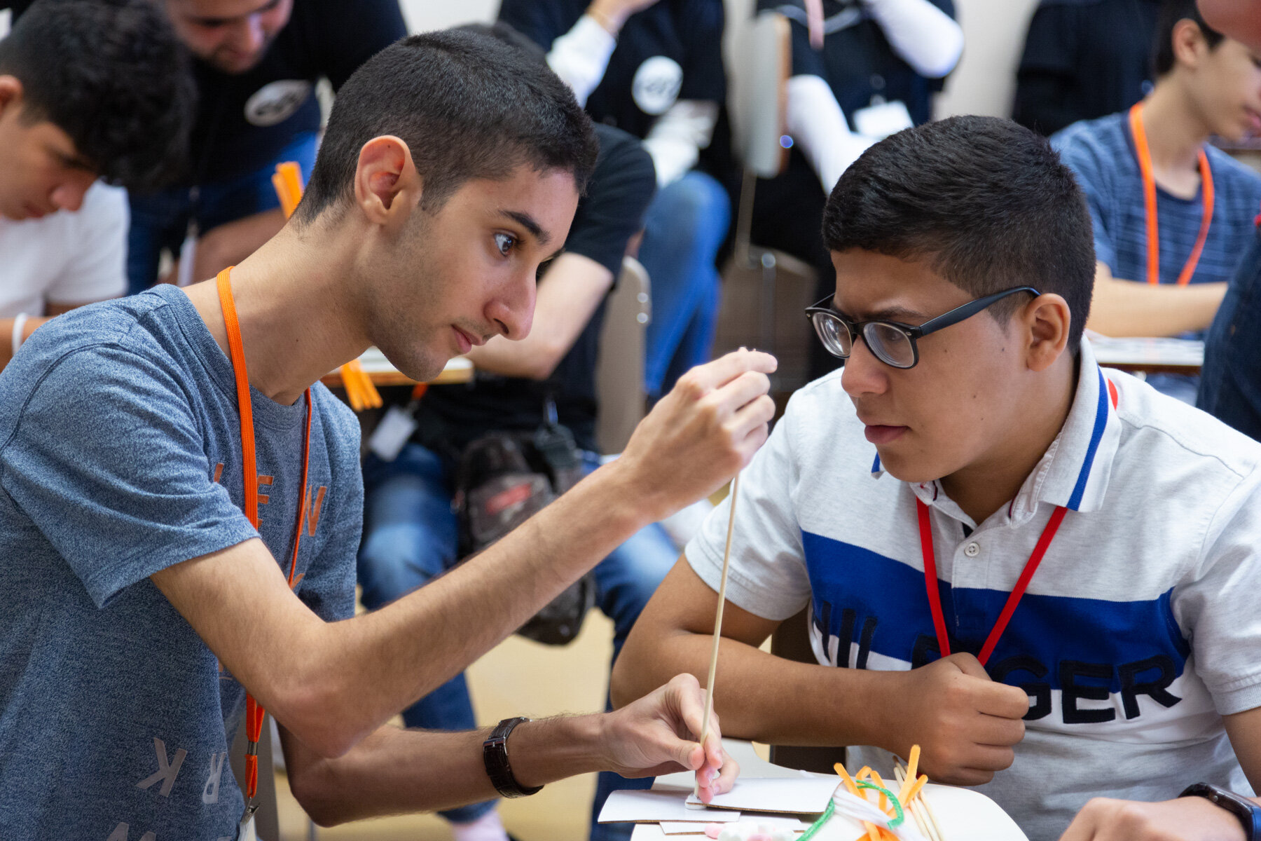 2 program participants collaborate on an art project