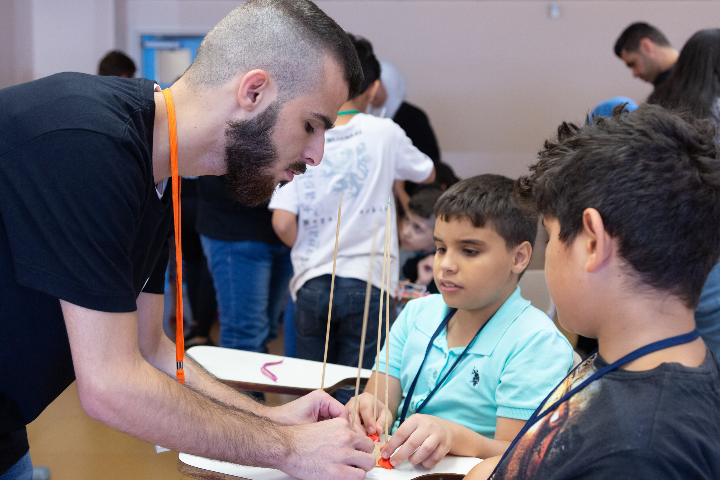 Volunteers and participants collaborate on a project
