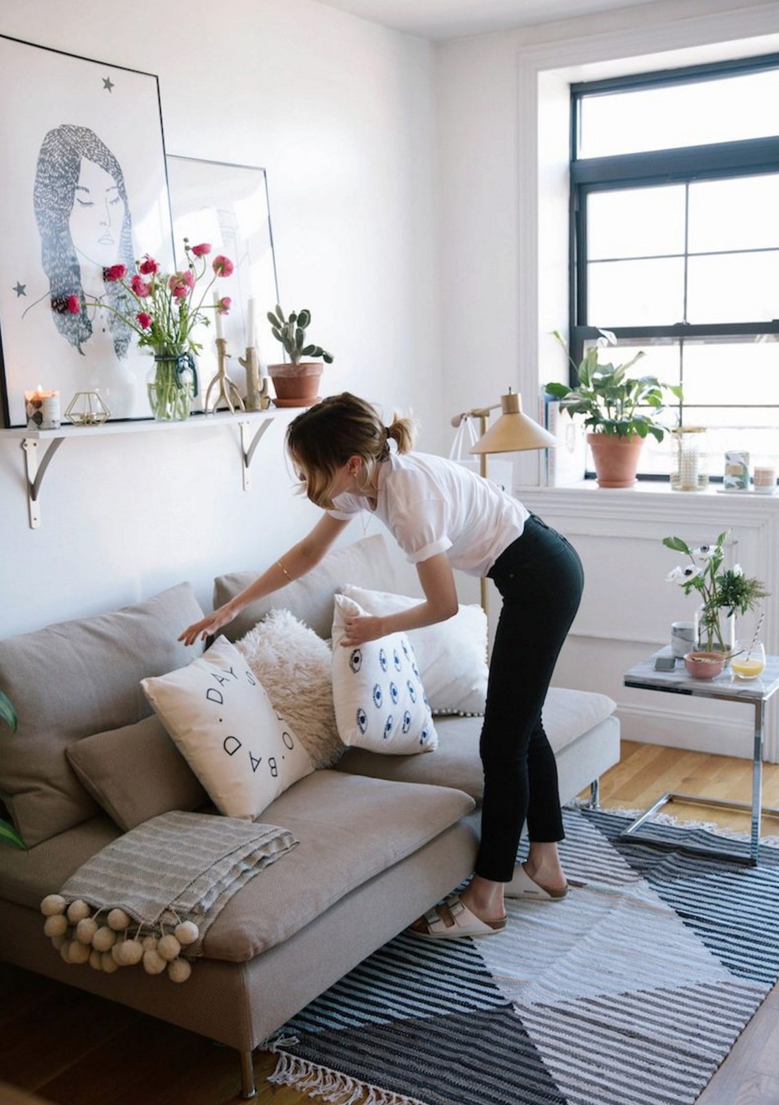 This tiny neutral living room is just adorable. Image via Urban Outfitters blog .