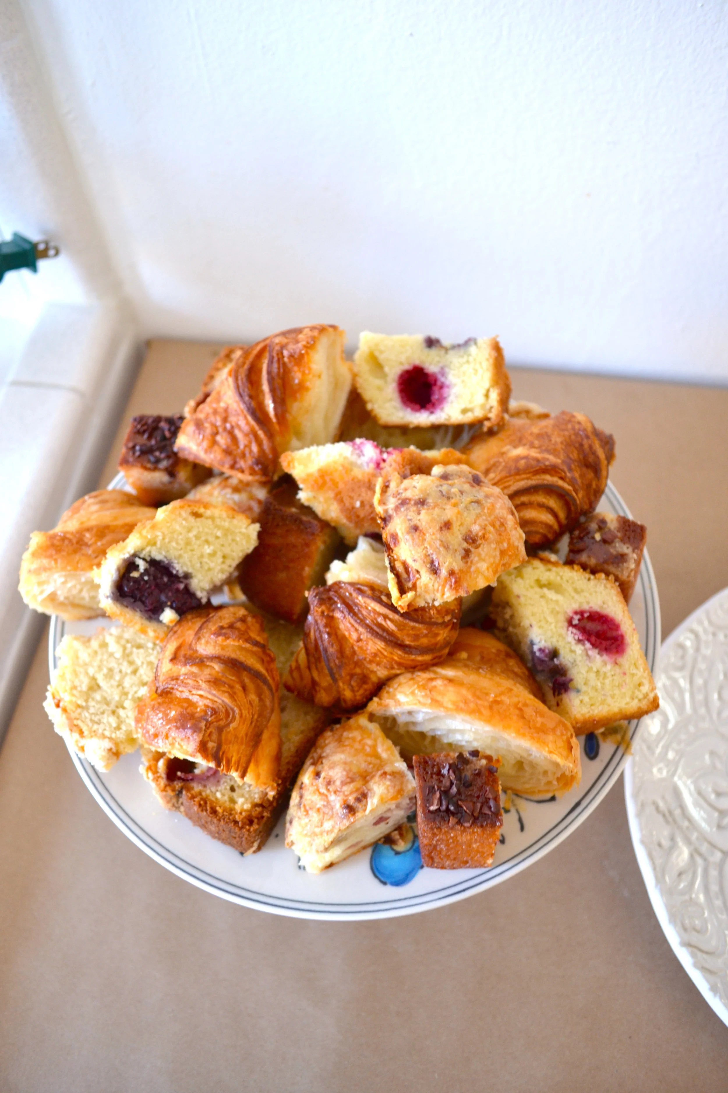 And as a pastry holder at the last wedding shower we threw . You can see the height it adds to the table in the corner below. 