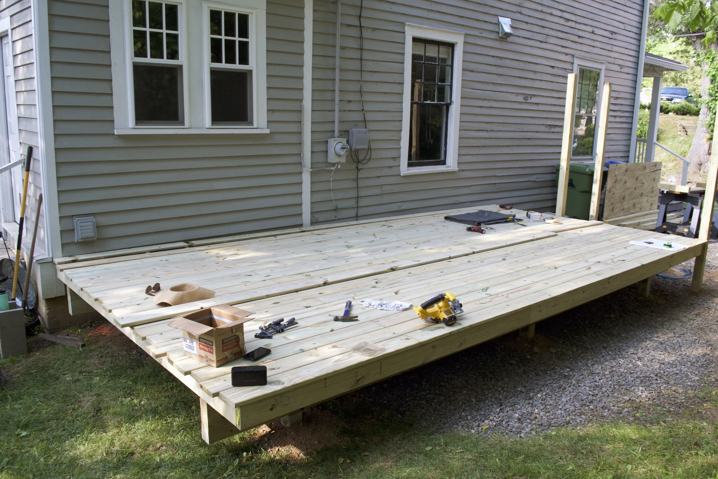 Deck boards before being cut with the track saw. They are so uneven.